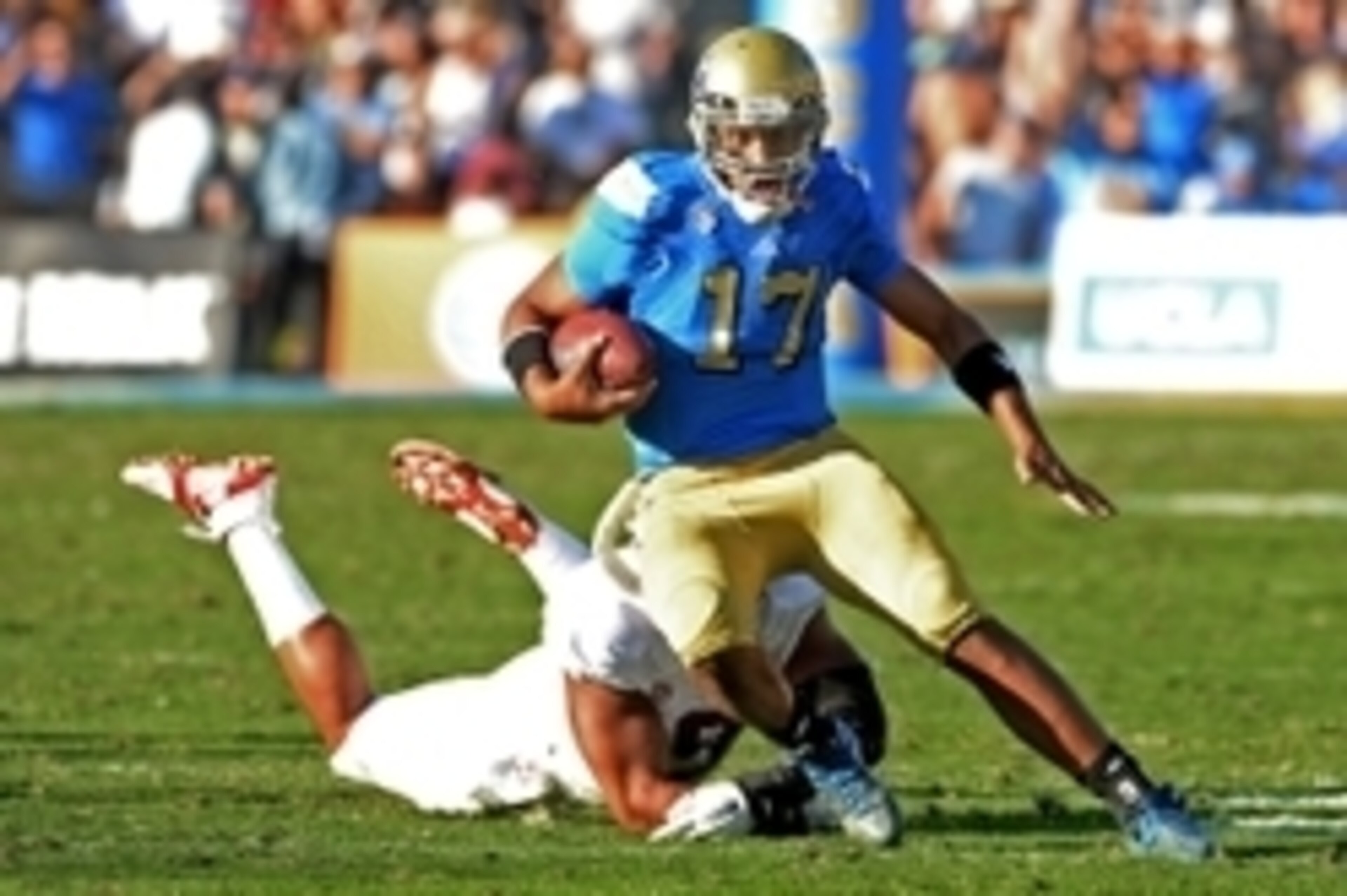 Nov 28, 2014; Pasadena, CA, USA; UCLA Bruins quarterback Brett Hundley (17) is pursued by Stanford Cardinal linebacker James Vaughters (9) in the second half of the game at the Rose Bowl. Stanford won 31-10. Mandatory Credit: Jayne Kamin-Oncea-USA TODAY S Nov 28, 2014; Pasadena, CA, USA; UCLA Bruins quarterback Brett Hundley (17) is pursued by Stanford Cardinal linebacker James Vaughters (9) in the second half of the game at the Rose Bowl. Stanford won 31-10. Mandatory Credit: Jayne Kamin-Oncea-USA TODAY S