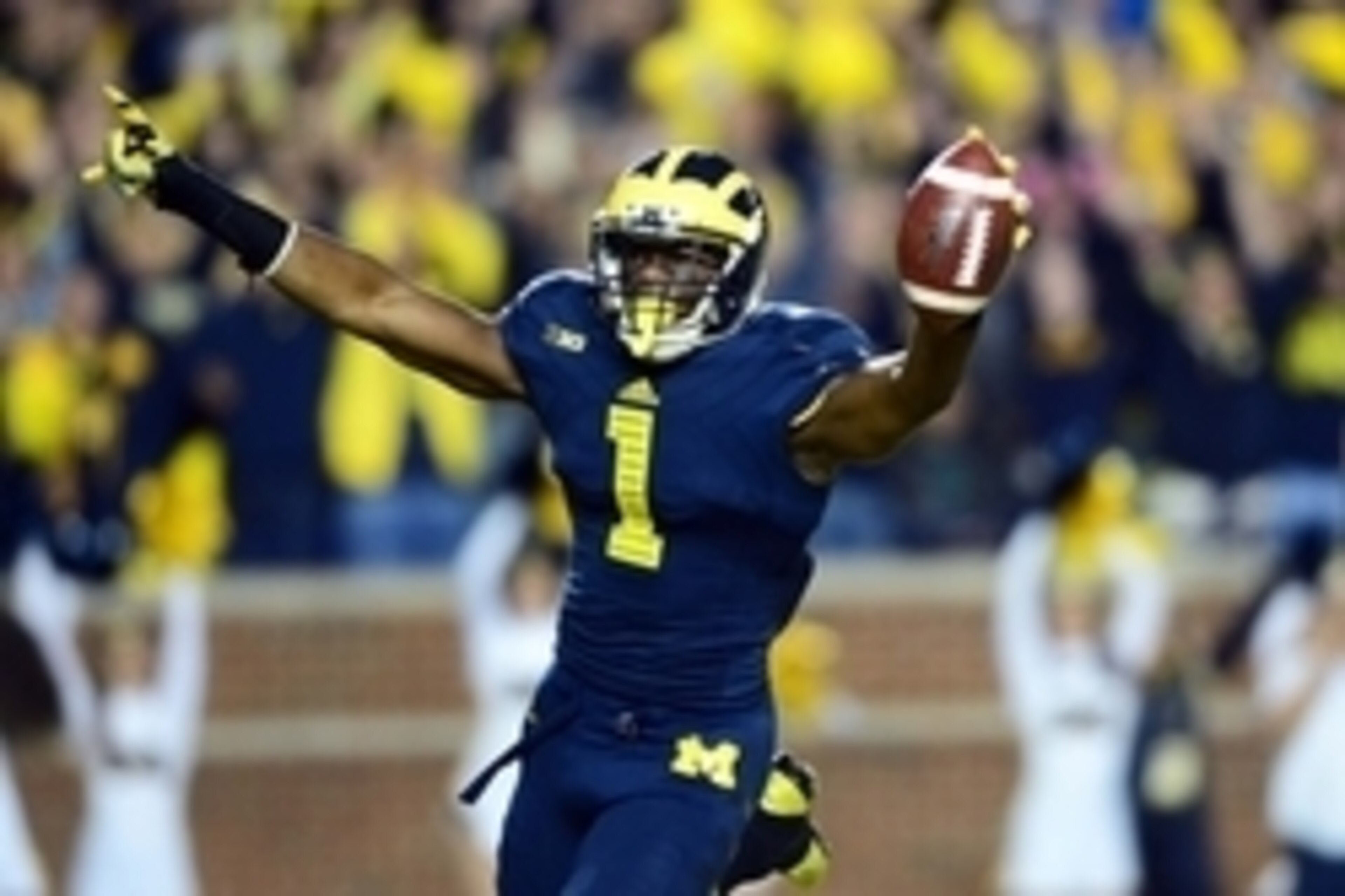 Oct 11, 2014; Ann Arbor, MI, USA; Michigan Wolverines wide receiver Devin Funchess (1) celebrates after scoring a touchdown during the first quarter against the Penn State Nittany Lions at Michigan Stadium. Mandatory Credit: Andrew Weber-USA TODAY Sports Oct 11, 2014; Ann Arbor, MI, USA; Michigan Wolverines wide receiver Devin Funchess (1) celebrates after scoring a touchdown during the first quarter against the Penn State Nittany Lions at Michigan Stadium. Mandatory Credit: Andrew Weber-USA TODAY Sports