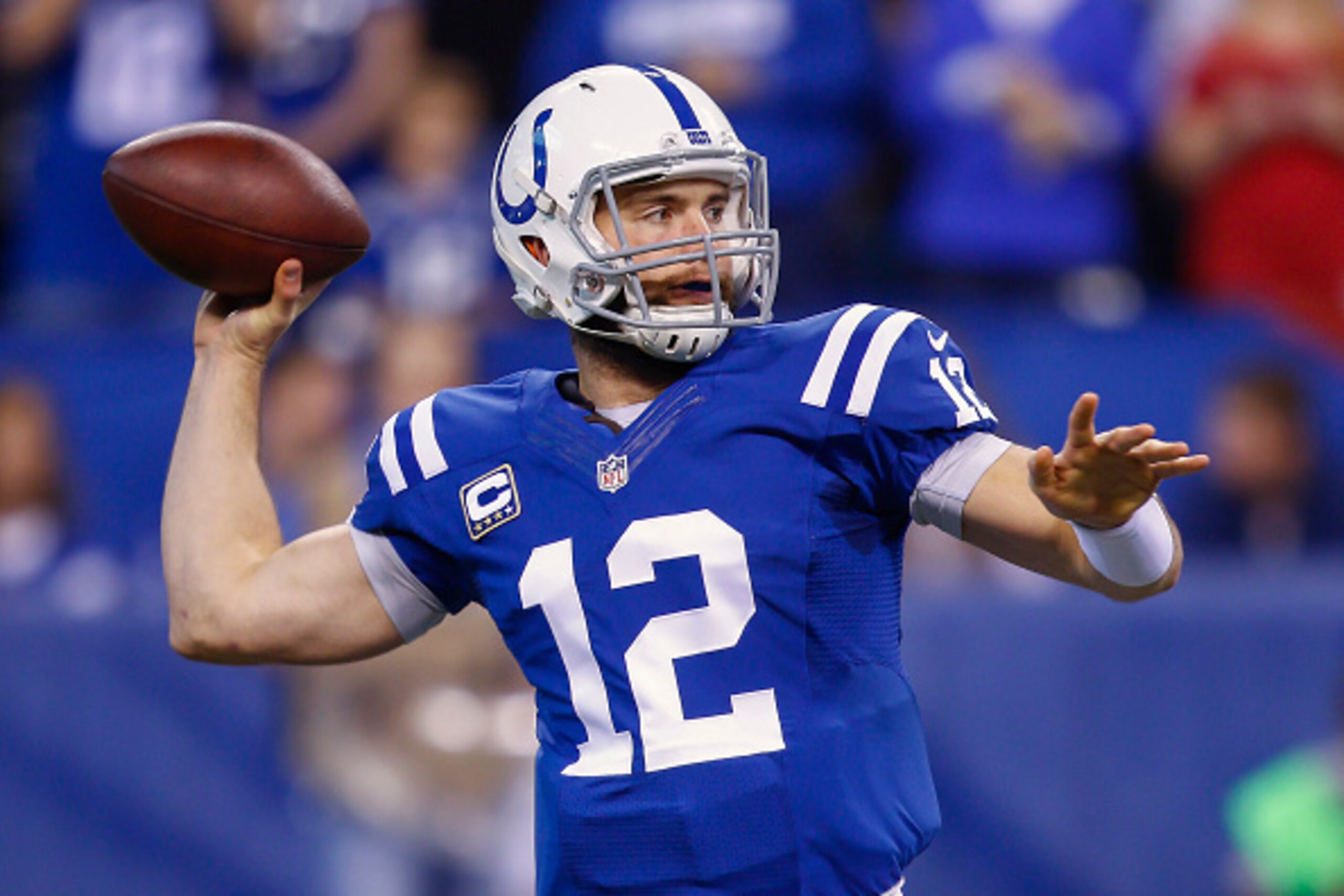 INDIANAPOLIS, IN - DECEMBER  14: Andrew Luck #12 of the Indianapolis Colts drops back to pass during the game against the Houston Texans at Lucas Oil Stadium on December 14, 2014 in Indianapolis, Indiana. (Photo by Michael Hickey/Getty Images)