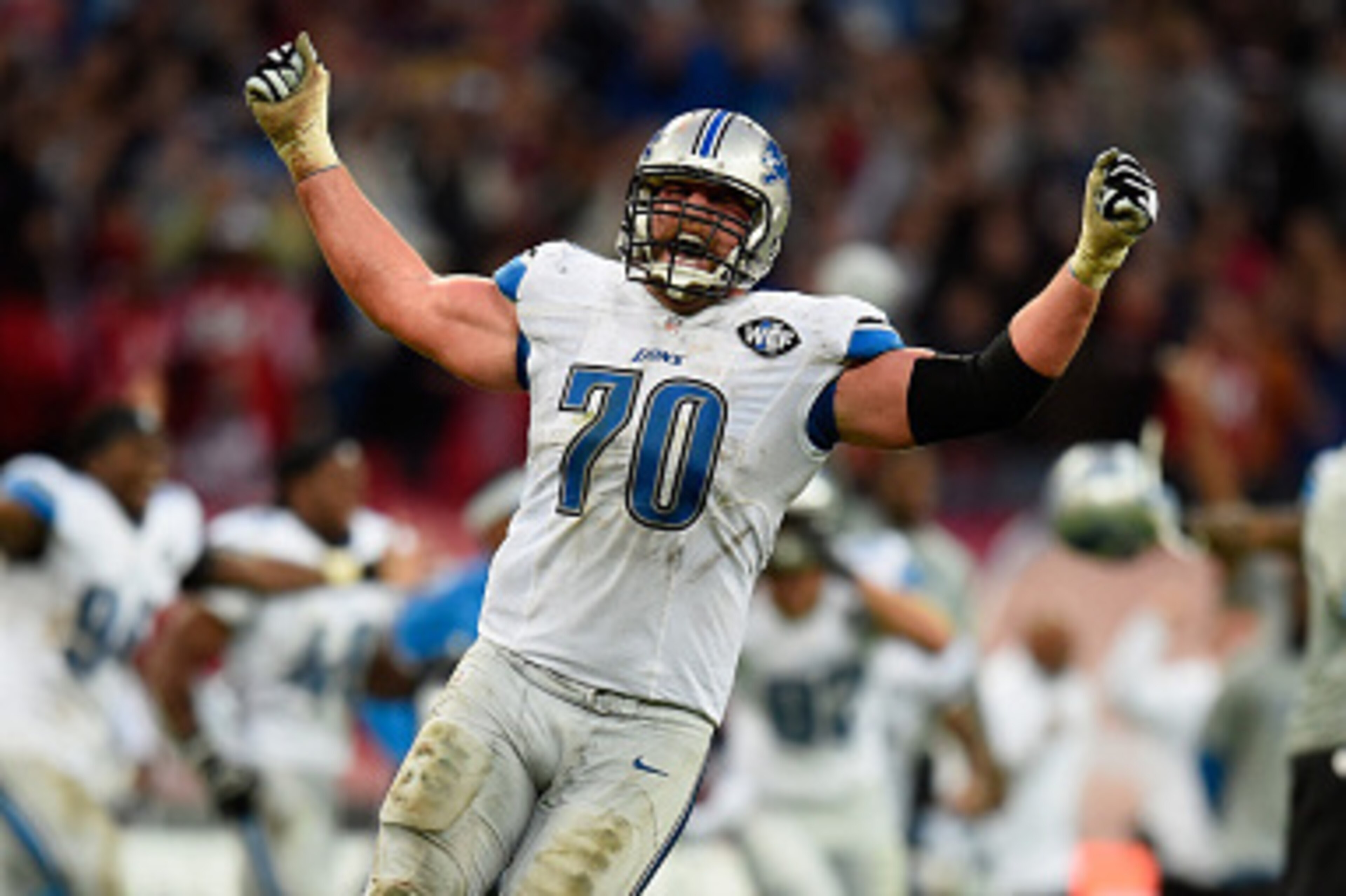 LONDON, ENGLAND - OCTOBER 26:  Garrett Reynolds #70 of the Detroit Lions celebrates victory during the NFL match between Detroit Lions and  Atlanta Falcons at Wembley Stadium on October 26, 2014 in London, England.  (Photo by Mike Hewitt/Getty Images)