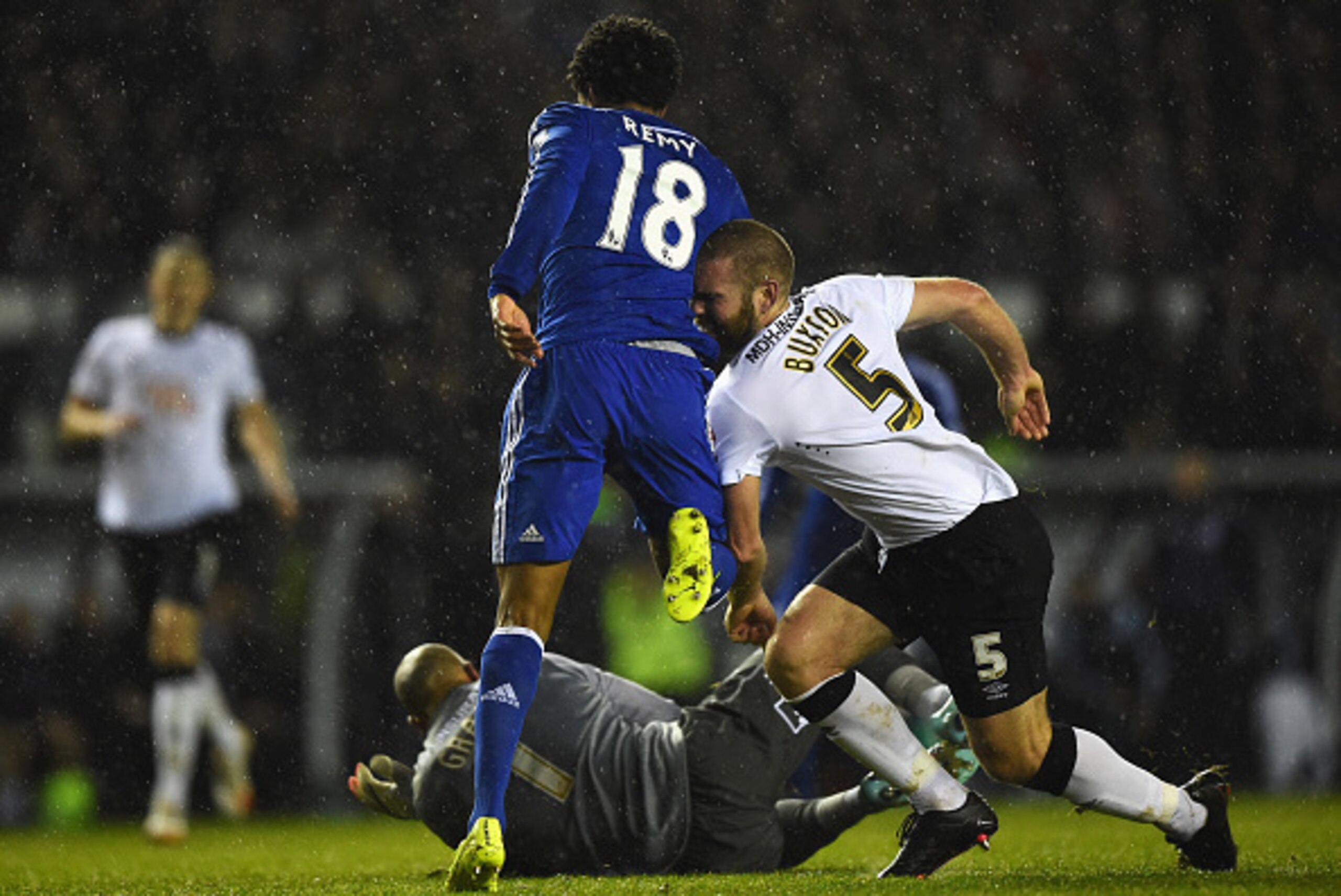DERBY, ENGLAND - DECEMBER 16: Jake Buxton of Derby collides with Loic Remy of Chelsea shortly before he was sent off during the Capital One Cup Quarter-Final match between Derby County and Chelsea at Pride Park Stadium on December 16, 2014 in Derby, Engla