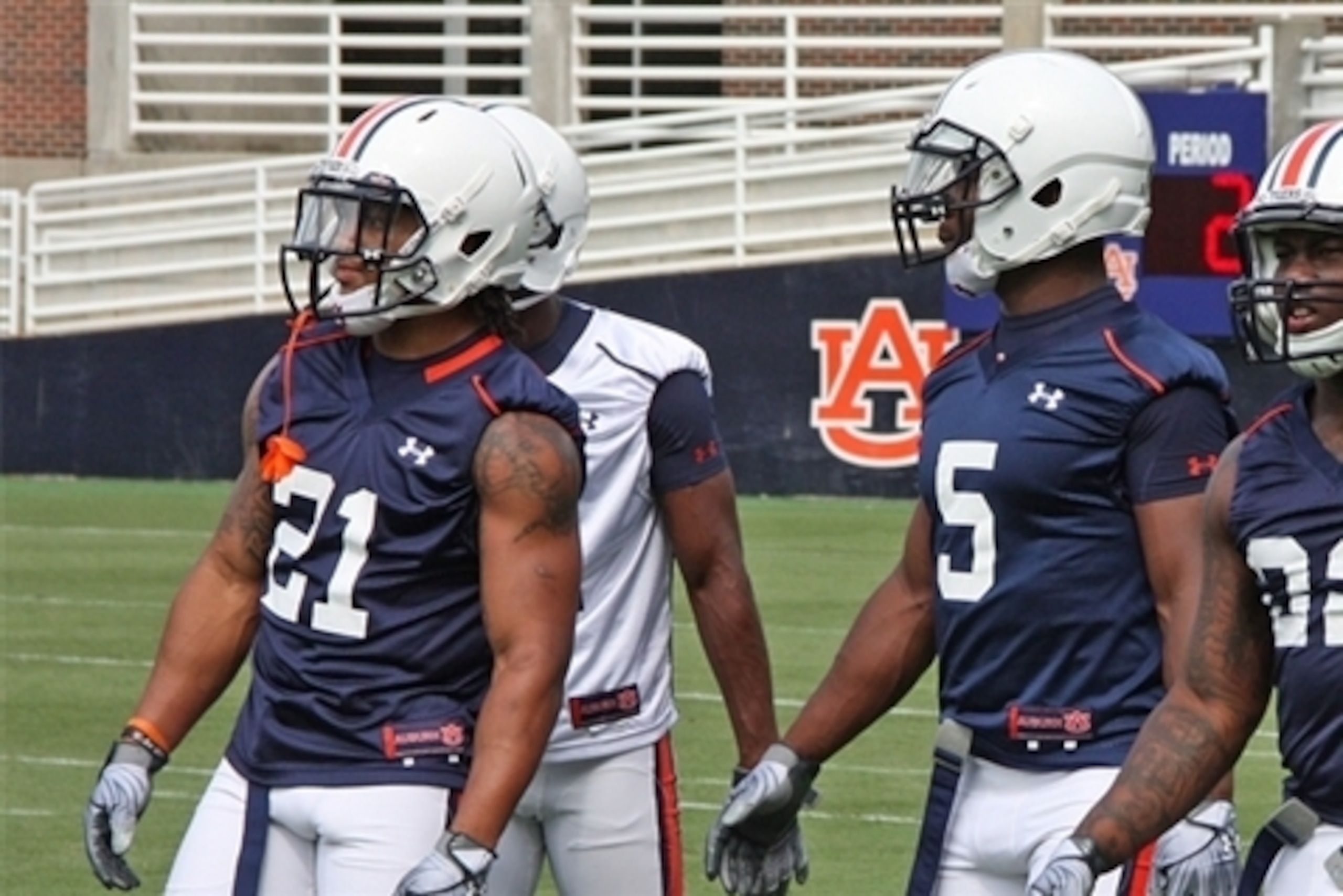 Robinson with former Auburn RB Tre Mason in 2012