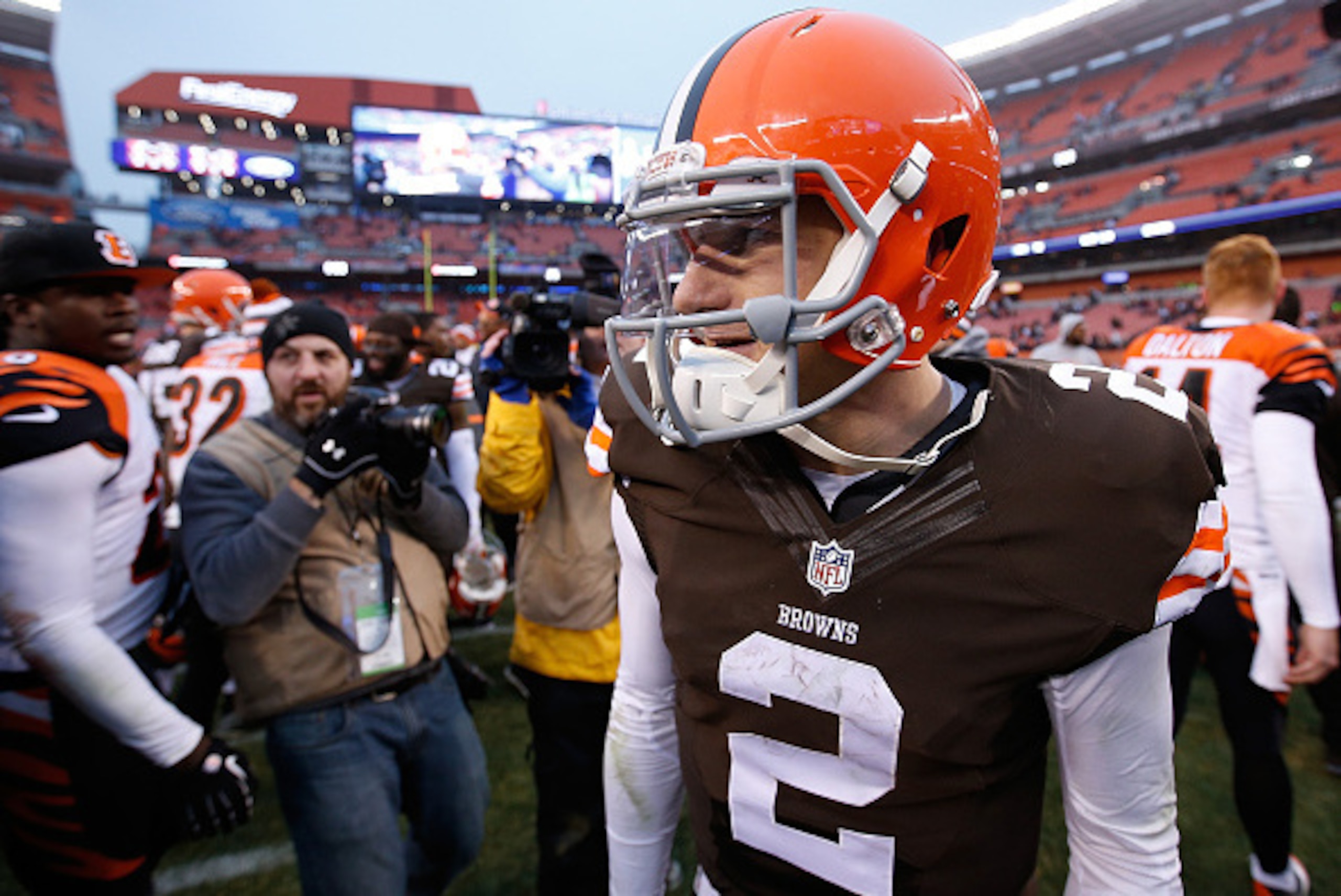 CLEVELAND, OH - DECEMBER 14:  Johnny Manziel #2 of the Cleveland Browns runs off the field after the Cincinnati Bengals 30-0 win at FirstEnergy Stadium on December 14, 2014 in Cleveland, Ohio.  (Photo by Joe Robbins/Getty Images)