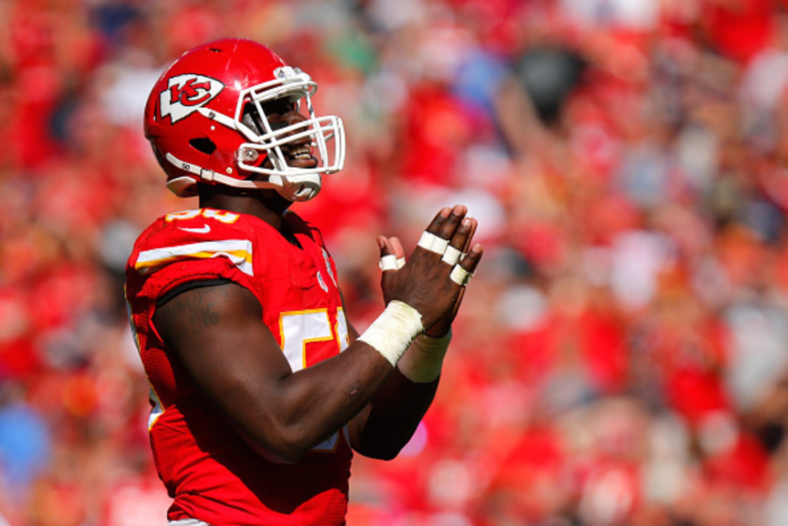 KANSAS CITY, MO - OCTOBER 26:  Justin Houston #50 of the Kansas City Chiefs celebrates sacking  Austin Davis #9 of the St. Louis Rams at Arrowhead Stadium on October 26, 2014 in Kansas City, Missouri.  (Photo by Kyle Rivas/Getty Images)