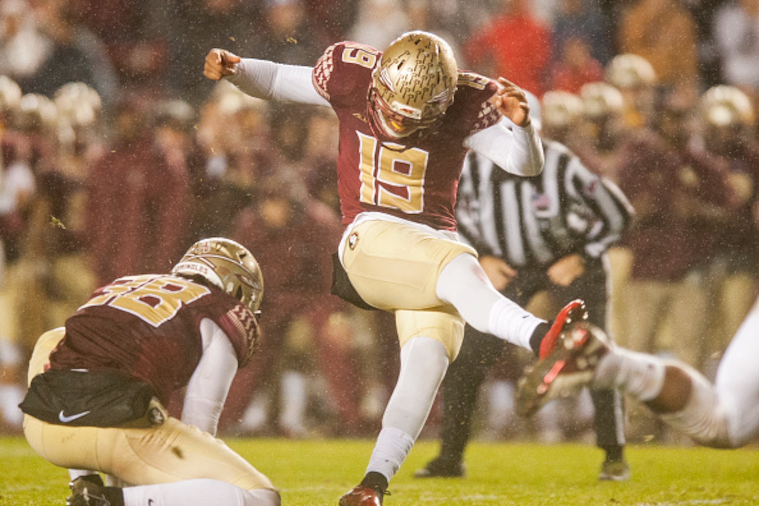 TALLAHASSEE, FL - NOVEMBER 22: Kicker Roberto Aguayo #19 of the Florida State Seminoles kicks the game winning field goal against the Boston College Eagles during the game at Doak Campbell Stadium on November 22, 2014 in Tallahassee, Florida. The Seminole