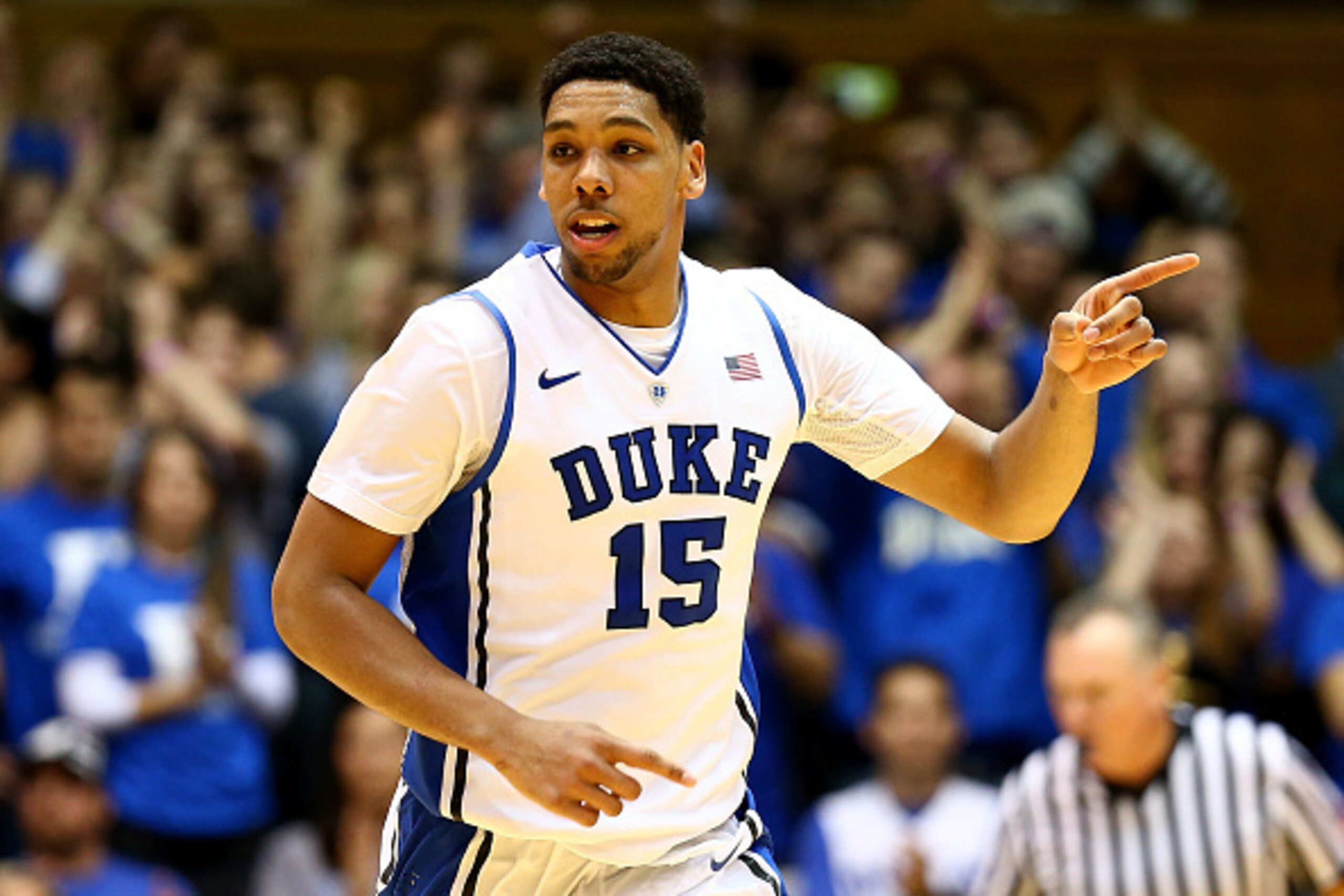 DURHAM, NC - DECEMBER 15:  Jahlil Okafor #15 of the Duke Blue Devils reacts after a basket against the Elon Phoenix during their game at Cameron Indoor Stadium on December 15, 2014 in Durham, North Carolina.  (Photo by Streeter Lecka/Getty Images)