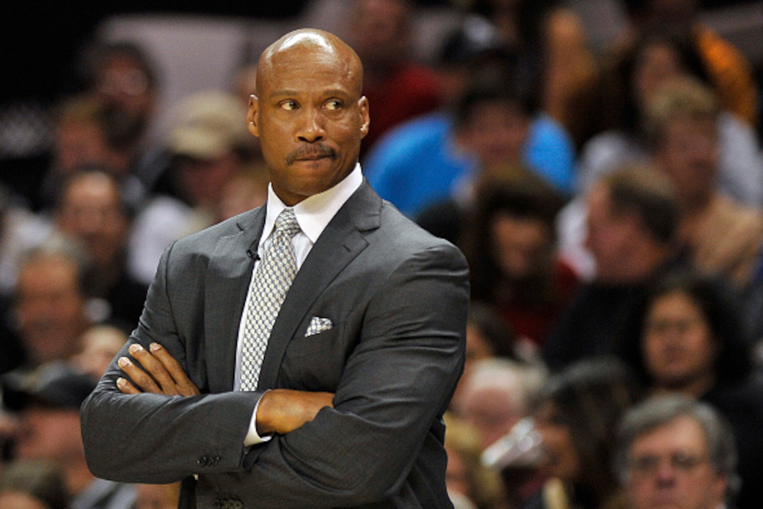 SAN ANTONIO, TX - DECEMBER 12: Head coach Byron Scott, of the Los Angeles Lakers, watches play during the first half of an NBA basketball game against the San Antonio Spurs at the AT&T Center on December 12, 2014, in San Antonio, Texas. Los Angeles won 1 SAN ANTONIO, TX - DECEMBER 12: Head coach Byron Scott, of the Los Angeles Lakers, watches play during the first half of an NBA basketball game against the San Antonio Spurs at the AT&T Center on December 12, 2014, in San Antonio, Texas. Los Angeles won 1