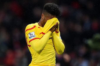 MANCHESTER, ENGLAND - DECEMBER 14:  Raheem Sterling of Liverpool shows his dejection at the end of the Barclays Premier League match between Manchester United and Liverpool at Old Trafford on December 14, 2014 in Manchester, England.  (Photo by Shaun Bott