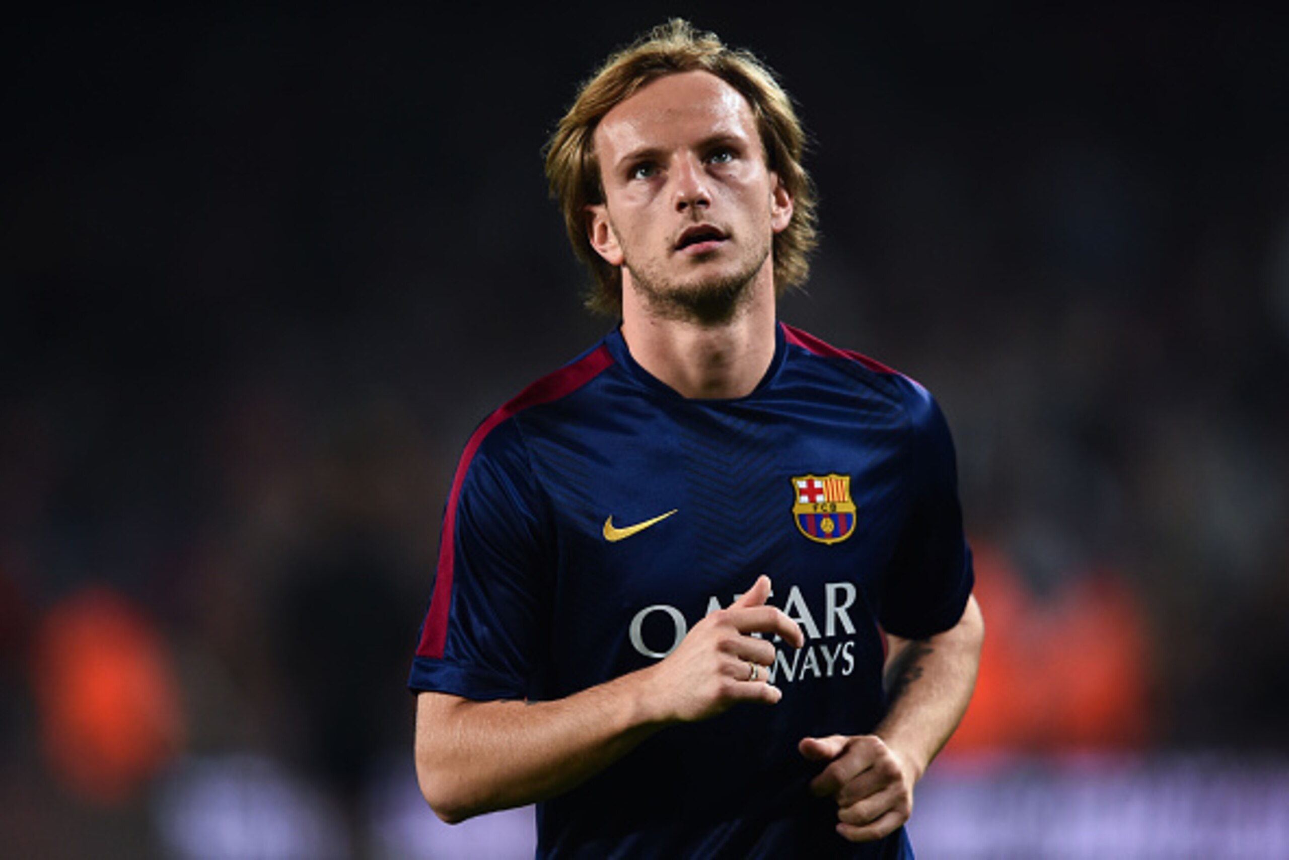 BARCELONA, SPAIN - NOVEMBER 22:  Ivan Rakitic of FC Barcelona looks on  during the warm-up prior to the La Liga match between FC Barcelona and Sevilla FC at Camp Nou on November 22, 2014 in Barcelona, Spain. Lionel Messi beat the  number of goal in the Sp