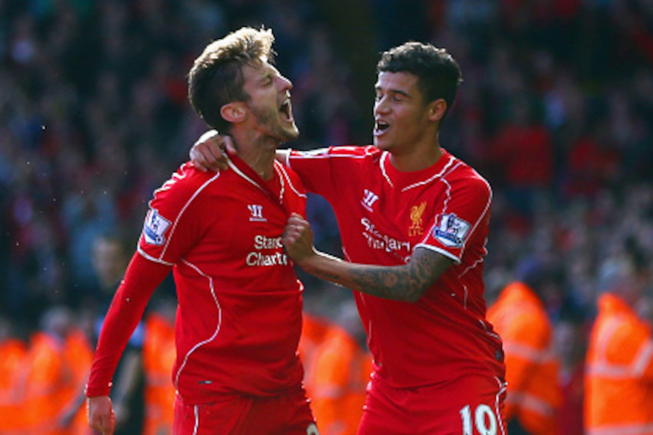 LIVERPOOL, ENGLAND - OCTOBER 04: Adam Lallana of Liverpool is congratulated by Philippe Coutinho of Liverpool (R) on scoring the opening goal during the Barclays Premier League match between Liverpool and West Bromwich Albion at Anfield on October 4, 201 LIVERPOOL, ENGLAND - OCTOBER 04: Adam Lallana of Liverpool is congratulated by Philippe Coutinho of Liverpool (R) on scoring the opening goal during the Barclays Premier League match between Liverpool and West Bromwich Albion at Anfield on October 4, 201
