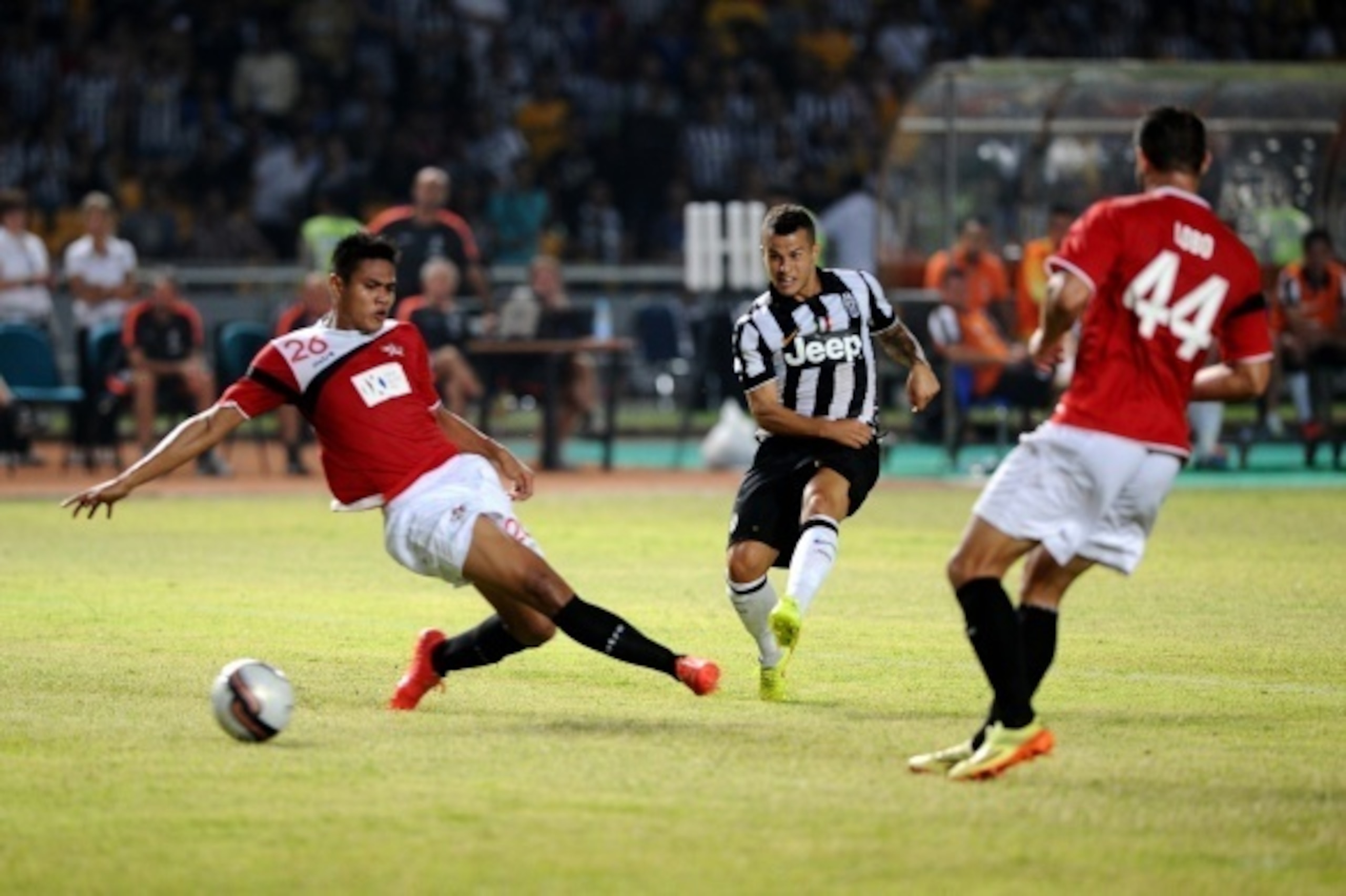 JAKARTA, INDONESIA - AUGUST 06:  Sebastian Giovinco (C) of Juventus FC  battle for the ball during the match between Indonesia Selection All Star Team and Juventus FC at Gelora Bung Karno Stadium on August 6, 2014 in Jakarta, Indonesia. Juventus FC win th