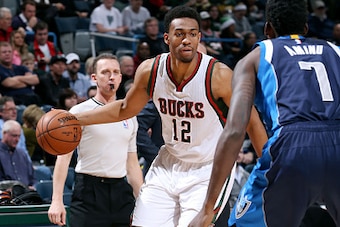 MILWAUKEE, WI - DECEMBER 3: Jabari Parker #12 of the Milwaukee Bucks handles the ball against the Dallas Mavericks on December 3, 2014 at the BMO Harris Bradley Center in Milwaukee, Wisconsin. NOTE TO USER: User expressly acknowledges and agrees that, by 