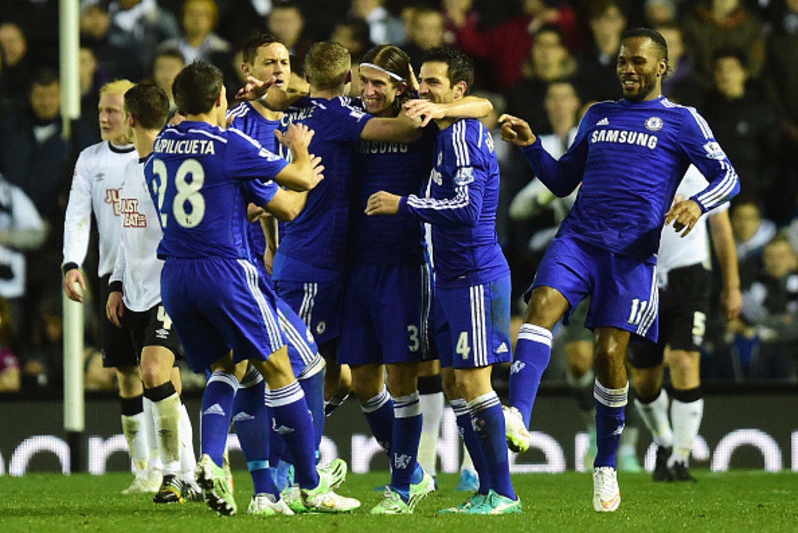 DERBY, ENGLAND - DECEMBER 16: Filipe Luis of Chelsea celebrates scoring his team's second goal during the Capital One Cup Quarter-Final match between Derby County and Chelsea at Pride Park Stadium on December 16, 2014 in Derby, England. (Photo by Jamie DERBY, ENGLAND - DECEMBER 16: Filipe Luis of Chelsea celebrates scoring his team's second goal during the Capital One Cup Quarter-Final match between Derby County and Chelsea at Pride Park Stadium on December 16, 2014 in Derby, England. (Photo by Jamie