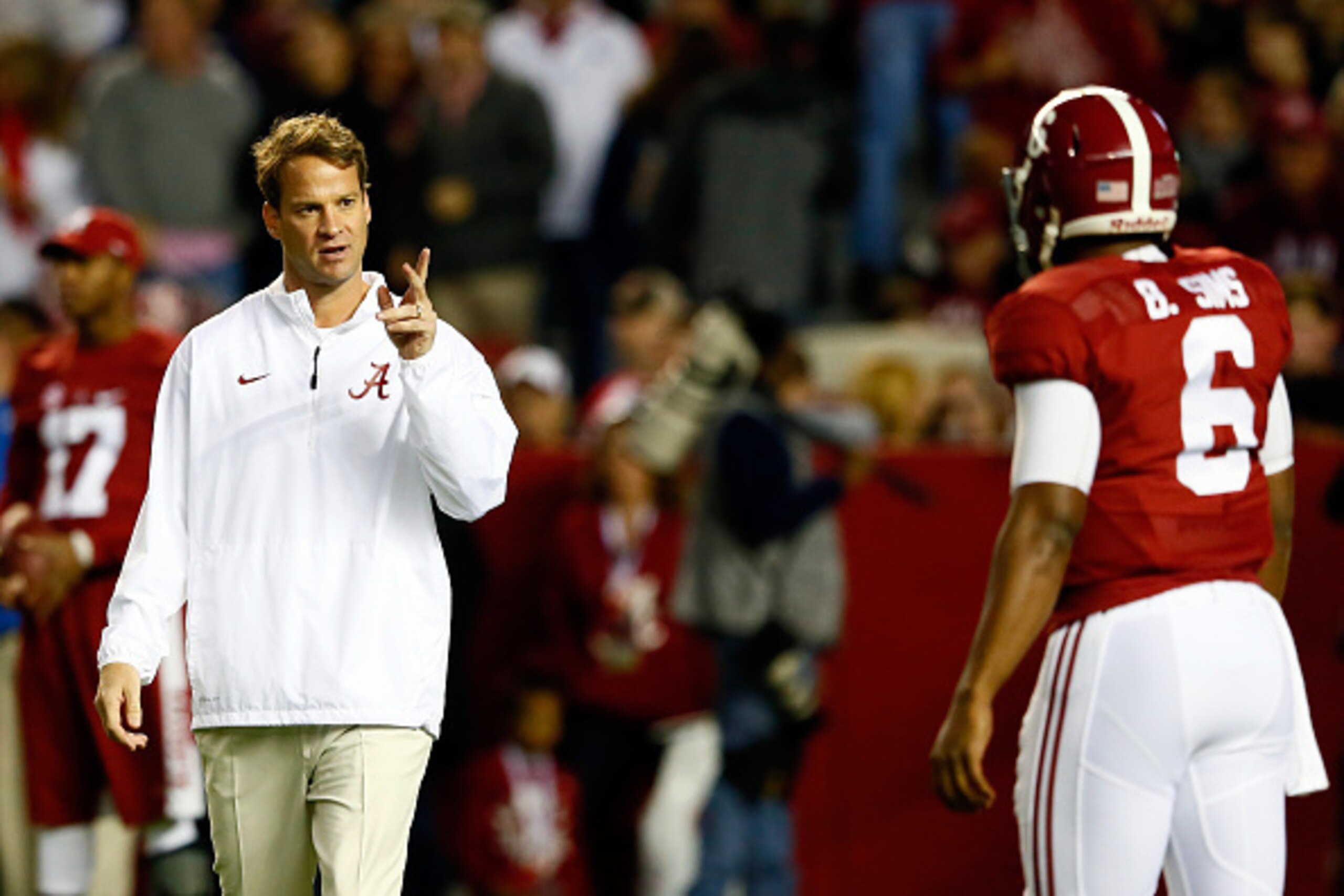 TUSCALOOSA, AL - NOVEMBER 29:  Lane Kiffin Offensive Coordinator at the University of Alabama talks with Blake Sims #6 during warm-ups prior to the Iron Bowl against the Auburn Tigers at Bryant-Denny Stadium on November 29, 2014 in Tuscaloosa, Alabama.  (