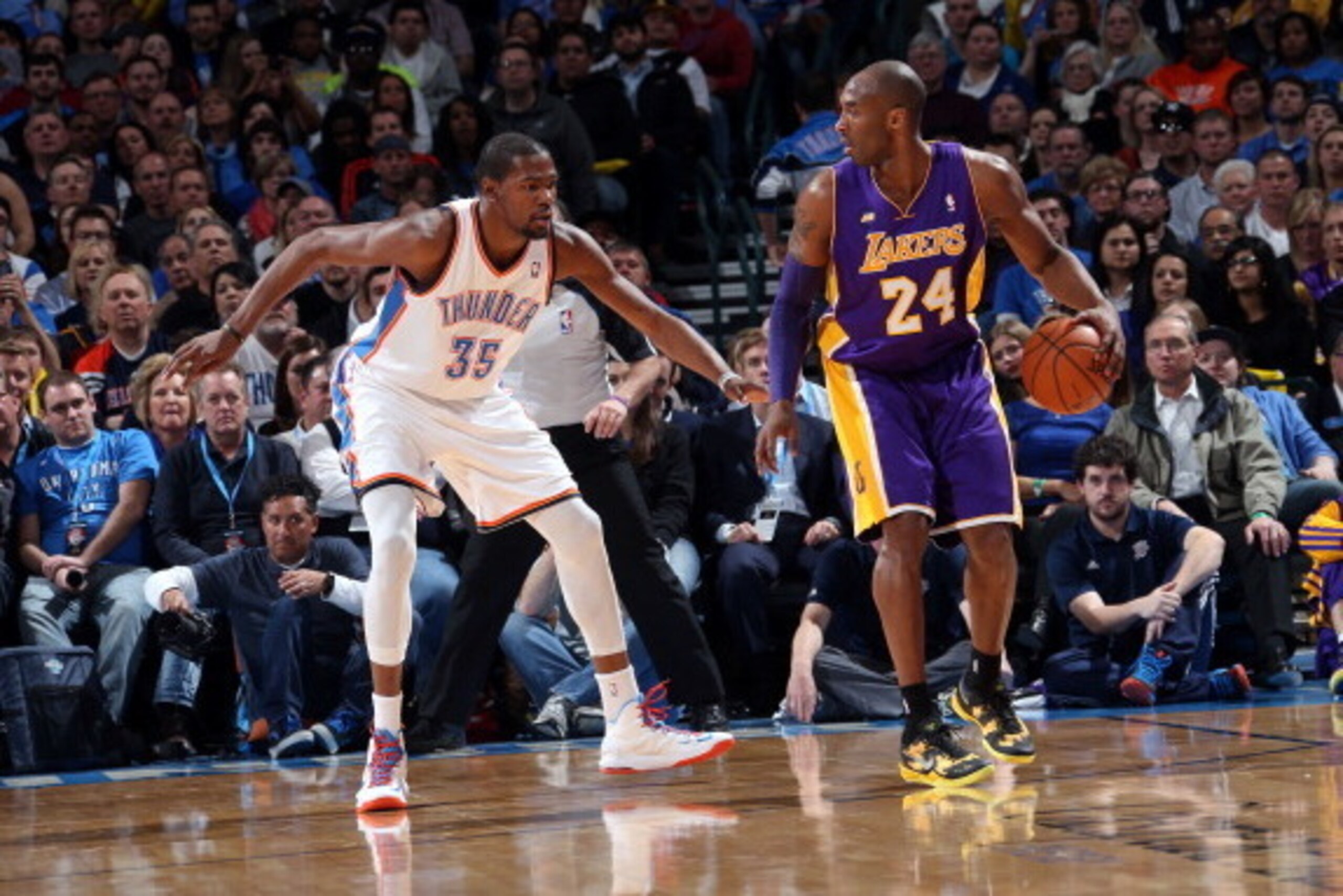 OKLAHOMA CITY, OK - MARCH 5: Kobe Bryant #24 of the Los Angeles Lakers controls the ball against Kevin Durant #35 of the Oklahoma City Thunder on March 5, 2013 at the Chesapeake Energy Arena in Oklahoma City, Oklahoma. NOTE TO USER: User expressly acknow OKLAHOMA CITY, OK - MARCH 5: Kobe Bryant #24 of the Los Angeles Lakers controls the ball against Kevin Durant #35 of the Oklahoma City Thunder on March 5, 2013 at the Chesapeake Energy Arena in Oklahoma City, Oklahoma. NOTE TO USER: User expressly acknow