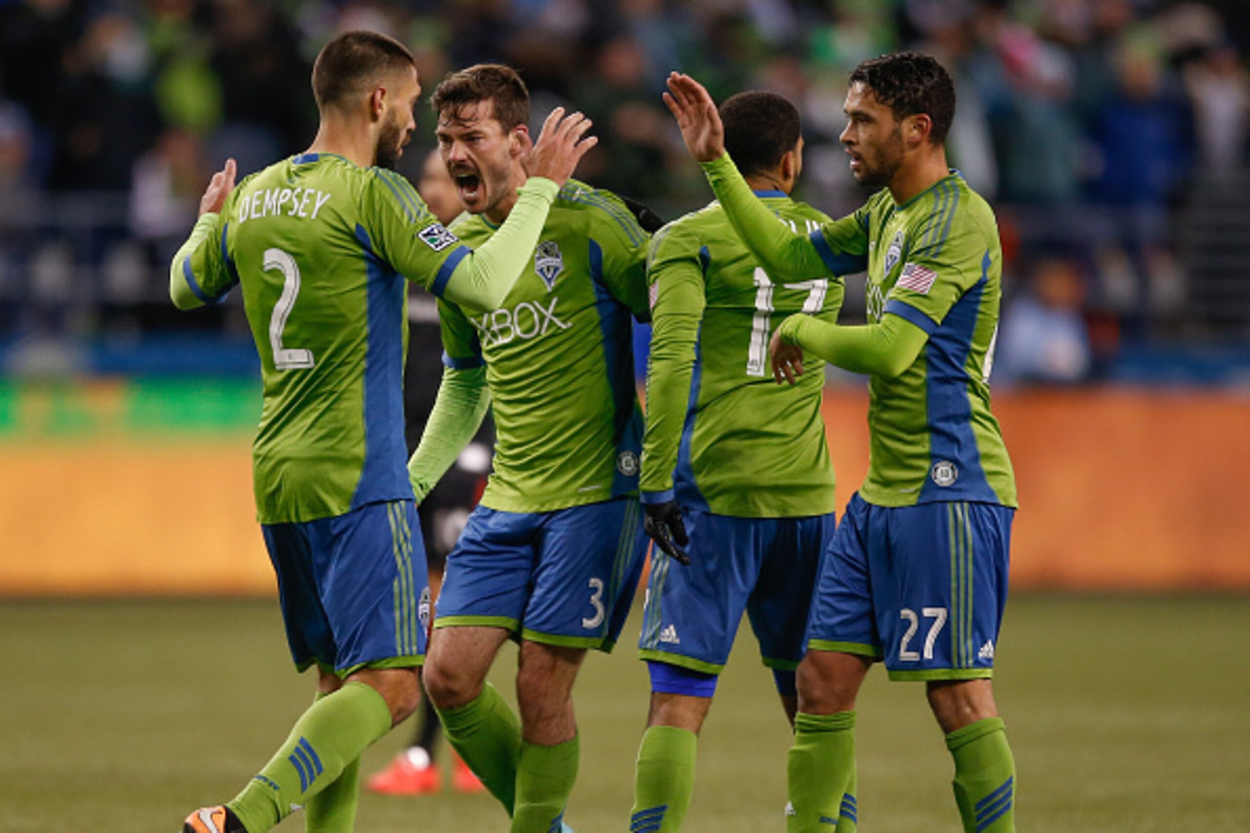 SEATTLE, WA - NOVEMBER 30:  Brad Evans #3 of the Seattle Sounders FC celebrates with teammates after scoring a goal against the Los Angeles Galaxy during the Western Conference Final at CenturyLink Field on November 30, 2014 in Seattle, Washington.  (Phot