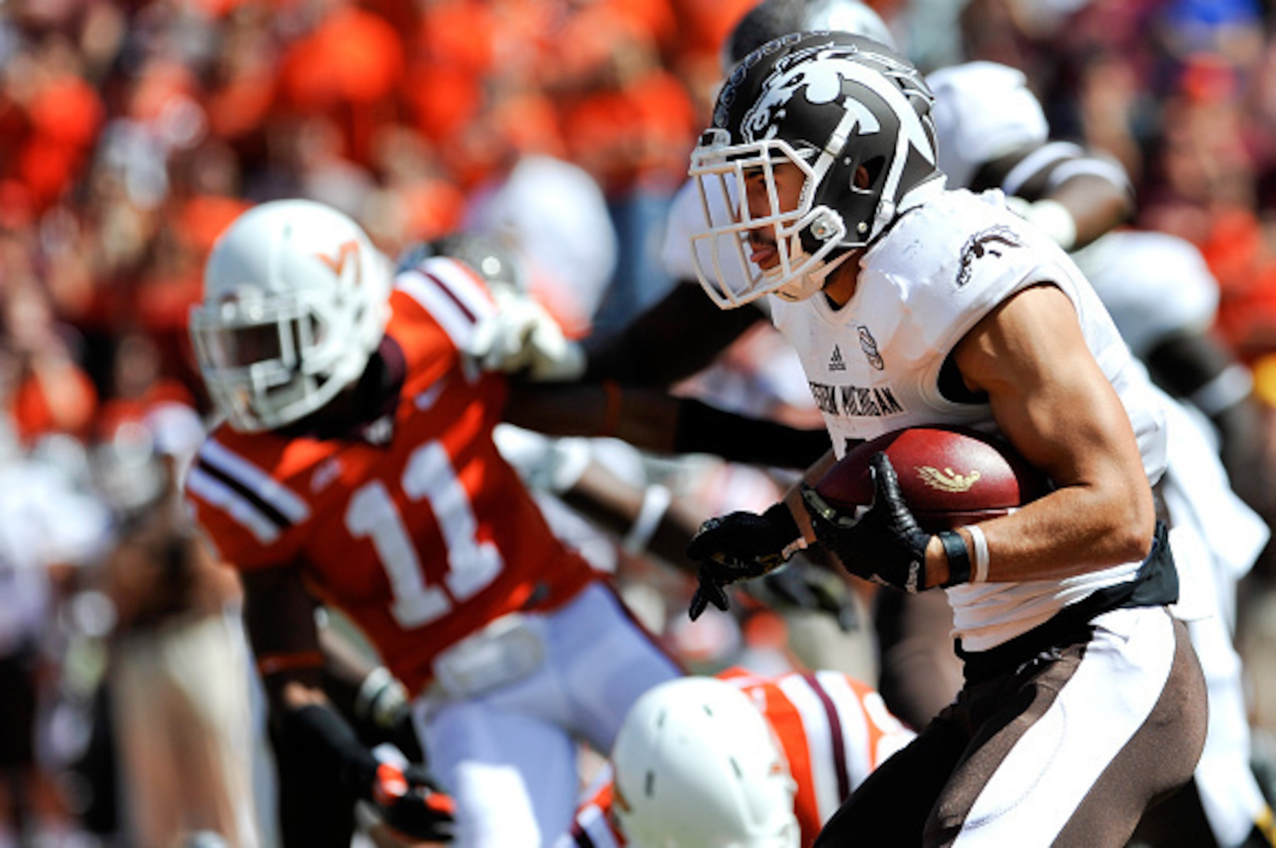 BLACKSBURG, VA - SEPTEMBER 27:  Wide receiver Daniel Braverman #8 of the Western Michigan Broncosrushes carries the ball on a reverse against Virginia Tech Hokies in the first half at Lane Stadium on September 27, 2014 in Blacksburg, Virginia. Virginia Te
