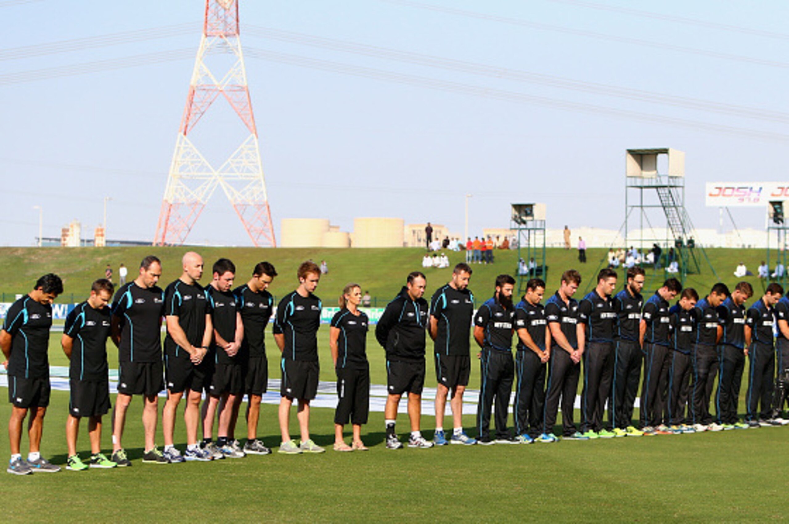 ABU DHABI, UNITED ARAB EMIRATES - DECEMBER 17:  Players of New Zealand observe a two-minute silence in memory of Pakistan school terror victims prior to the start of the 4th One Day International match between Pakistan and New Zealand at Sheikh Zayed Stad