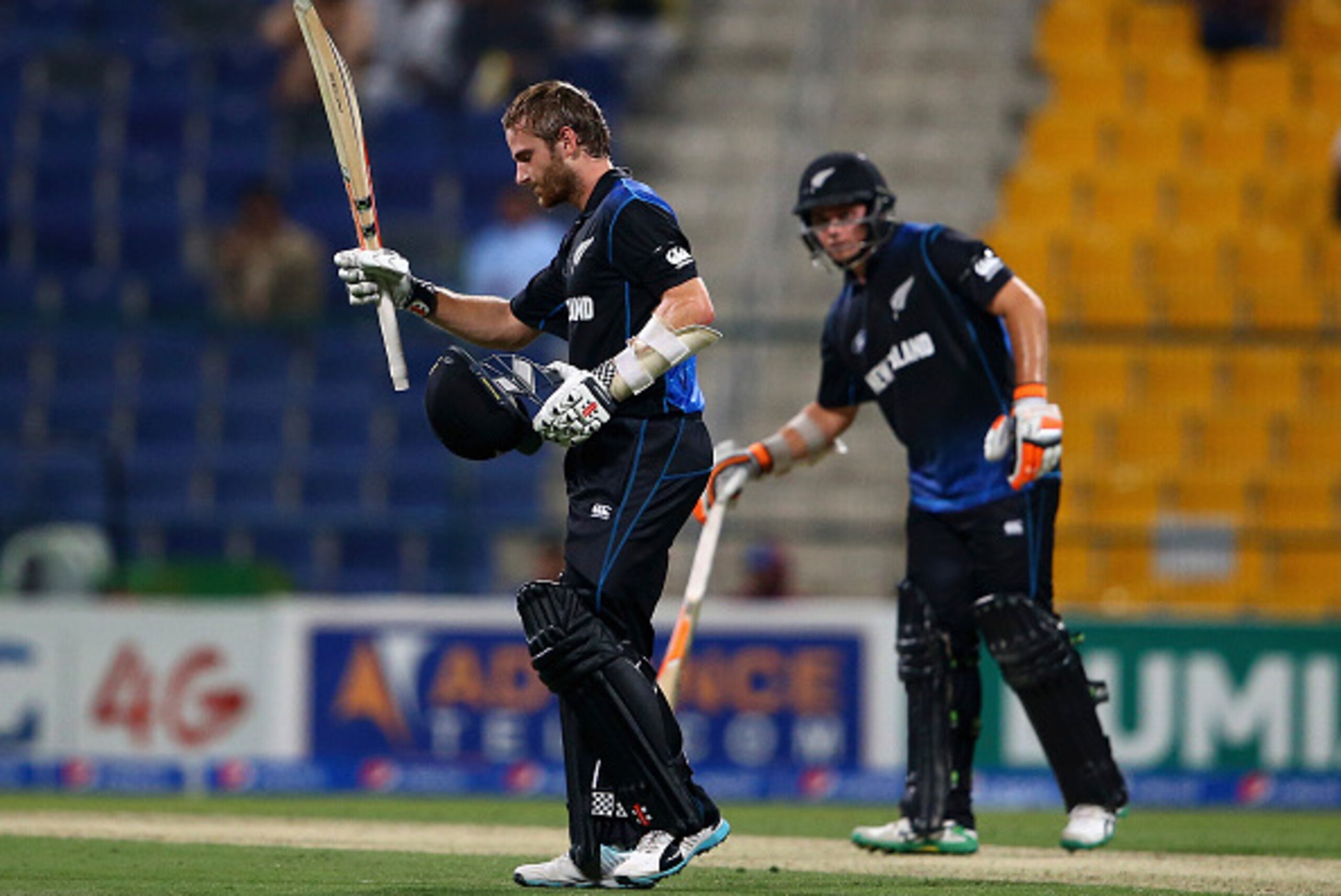 ABU DHABI, UNITED ARAB EMIRATES - DECEMBER 17: Kane Williamson of New Zealand celebrates after reaching his century during the 4th One Day International match between Pakistan and New Zealand at Sheikh Zayed Stadium on December 17, 2014 in Abu Dhabi, Unit