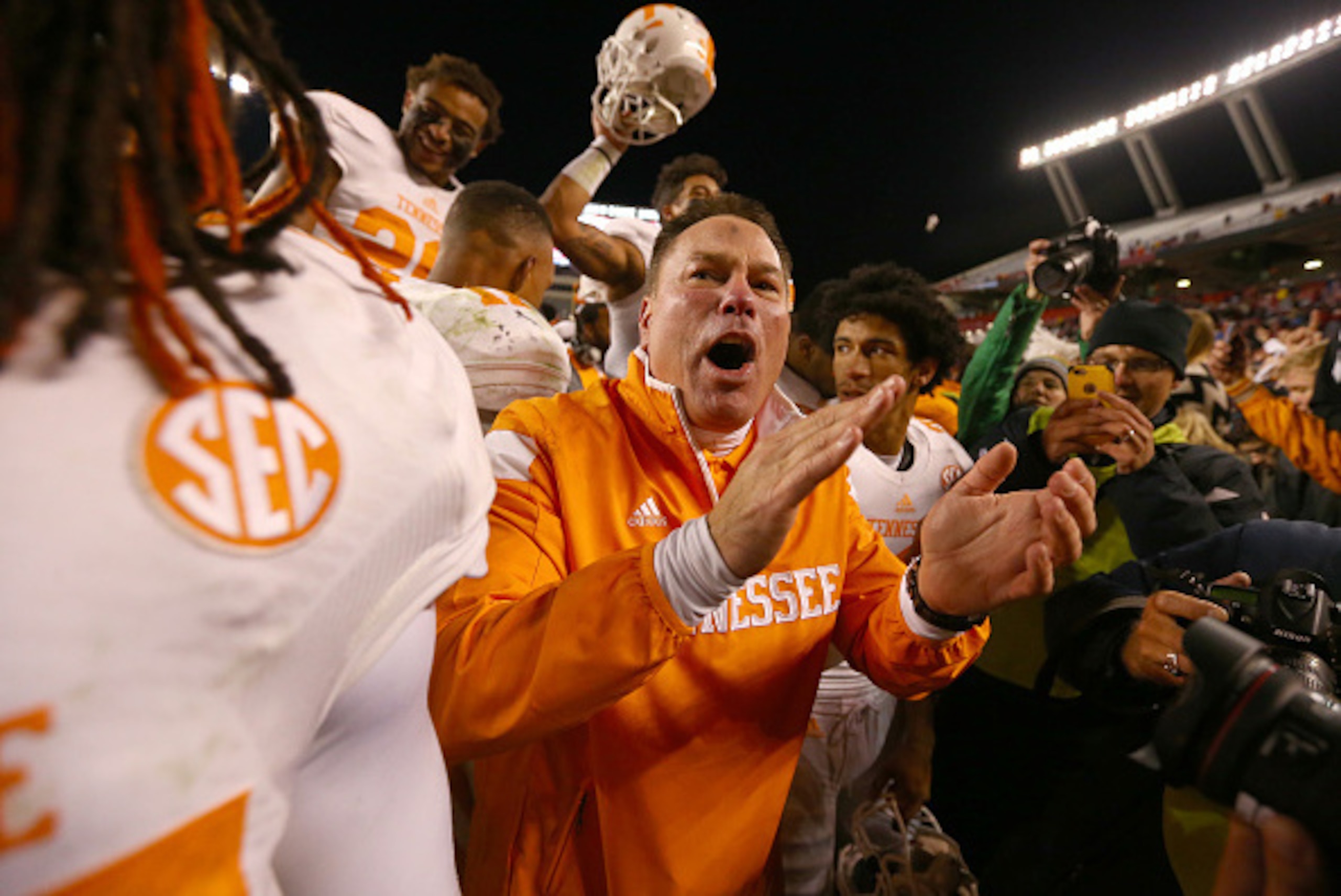 COLUMBIA, SC - NOVEMBER 01:  Head coach Butch Jones of the Tennessee Volunteers celebrates with his team after defeating the South Carolina Gamecocks 45-42 in overtime at Williams-Brice Stadium on November 1, 2014 in Columbia, South Carolina.  (Photo by S