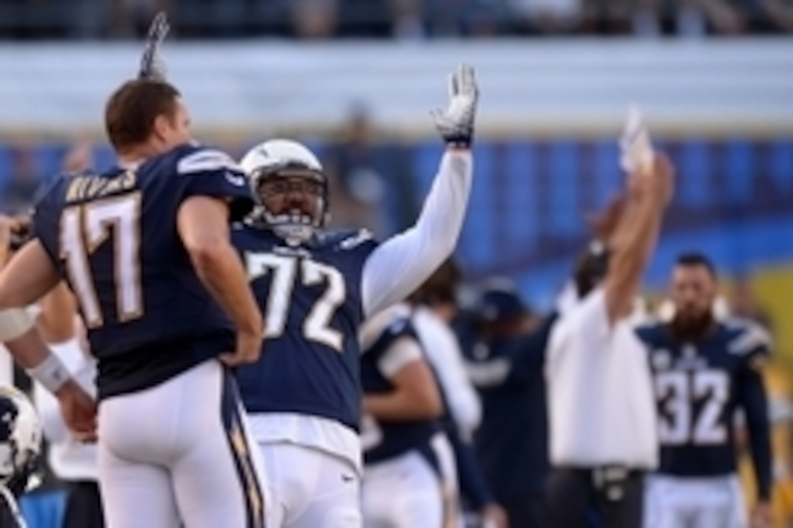 Nov 23, 2014; San Diego, CA, USA; San Diego Chargers defensive end Tenny Palepoi (72) reacts next to quarterback Philip Rivers (17) after a touchdown was confirmed by replay during the third quarter against the St. Louis Rams at Qualcomm Stadium. Mandator