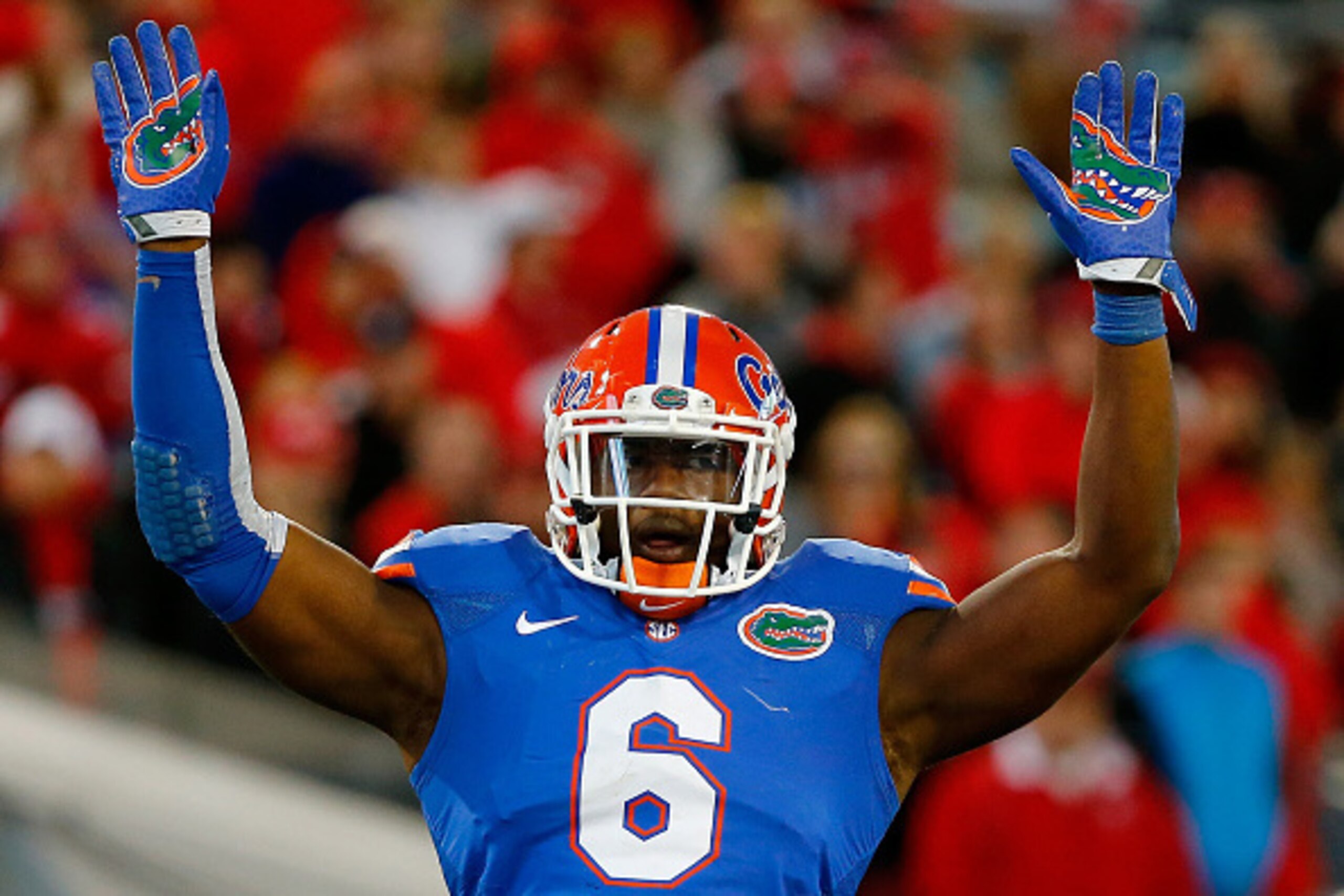 JACKSONVILLE, FL - NOVEMBER 01:  Dante Fowler #6 of the Florida Gators asks the crowd for noise during the game against the Georgia Bulldogs at EverBank Field on November 1, 2014 in Jacksonville, Florida.  (Photo by Sam Greenwood/Getty Images)