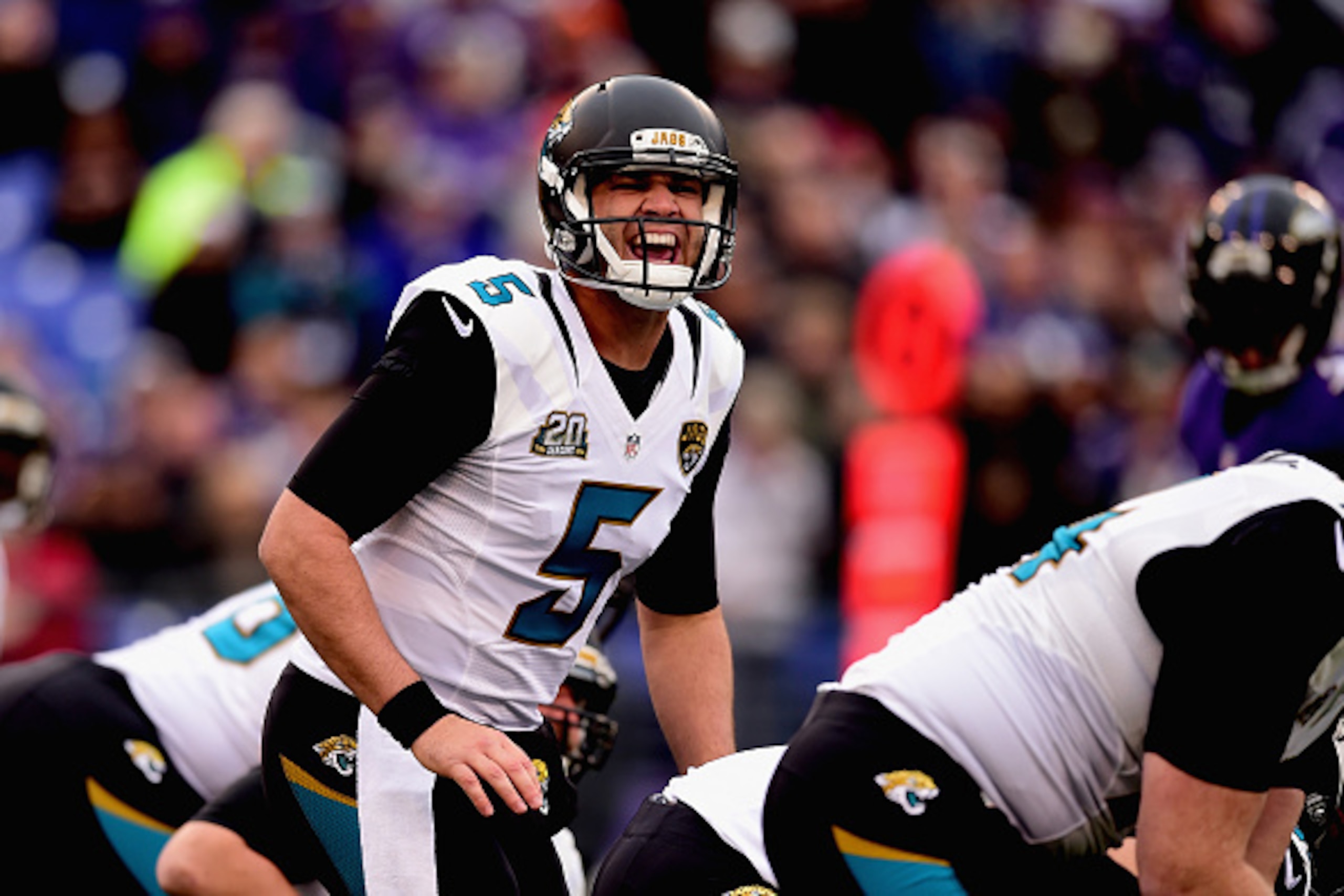 BALTIMORE, MD - DECEMBER 14: Quarterback Blake Bortles #5 of the Jacksonville Jaguars signals before the snap during the first quarter of a game against the Baltimore Ravens at M&T Bank Stadium on December 14, 2014 in Baltimore, Maryland.  (Photo by Patri
