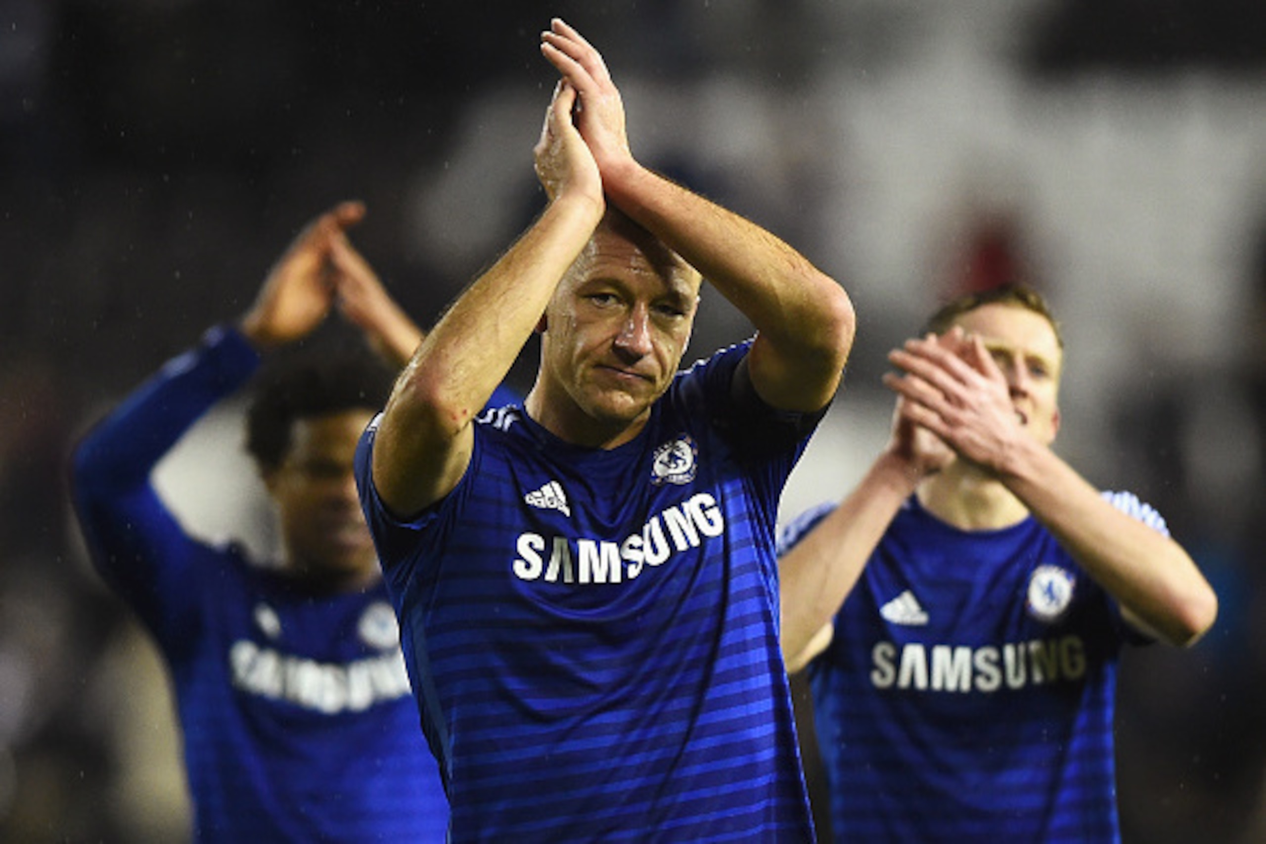 DERBY, ENGLAND - DECEMBER 16:  John Terry of Chelsea applauds the fans after the Capital One Cup Quarter-Final match between Derby County and Chelsea at Pride Park Stadium on December 16, 2014 in Derby, England.  (Photo by Laurence Griffiths/Getty Images)
