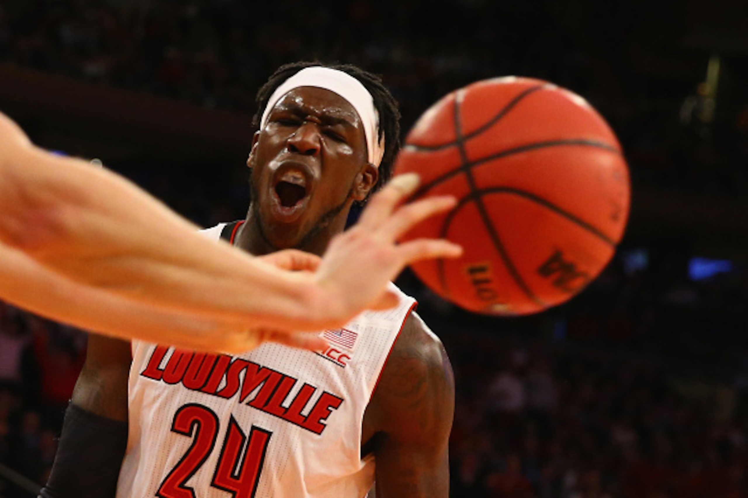 NEW YORK, NY - DECEMBER 09:  Montrezl Harrell #24 of the Louisville Cardinals taunts Collin Hartman #30 of the Indiana Hoosiers after making a basket during their game at the Jimmy V Classic in Madison Square Garden on December 9, 2014 in New York City.  