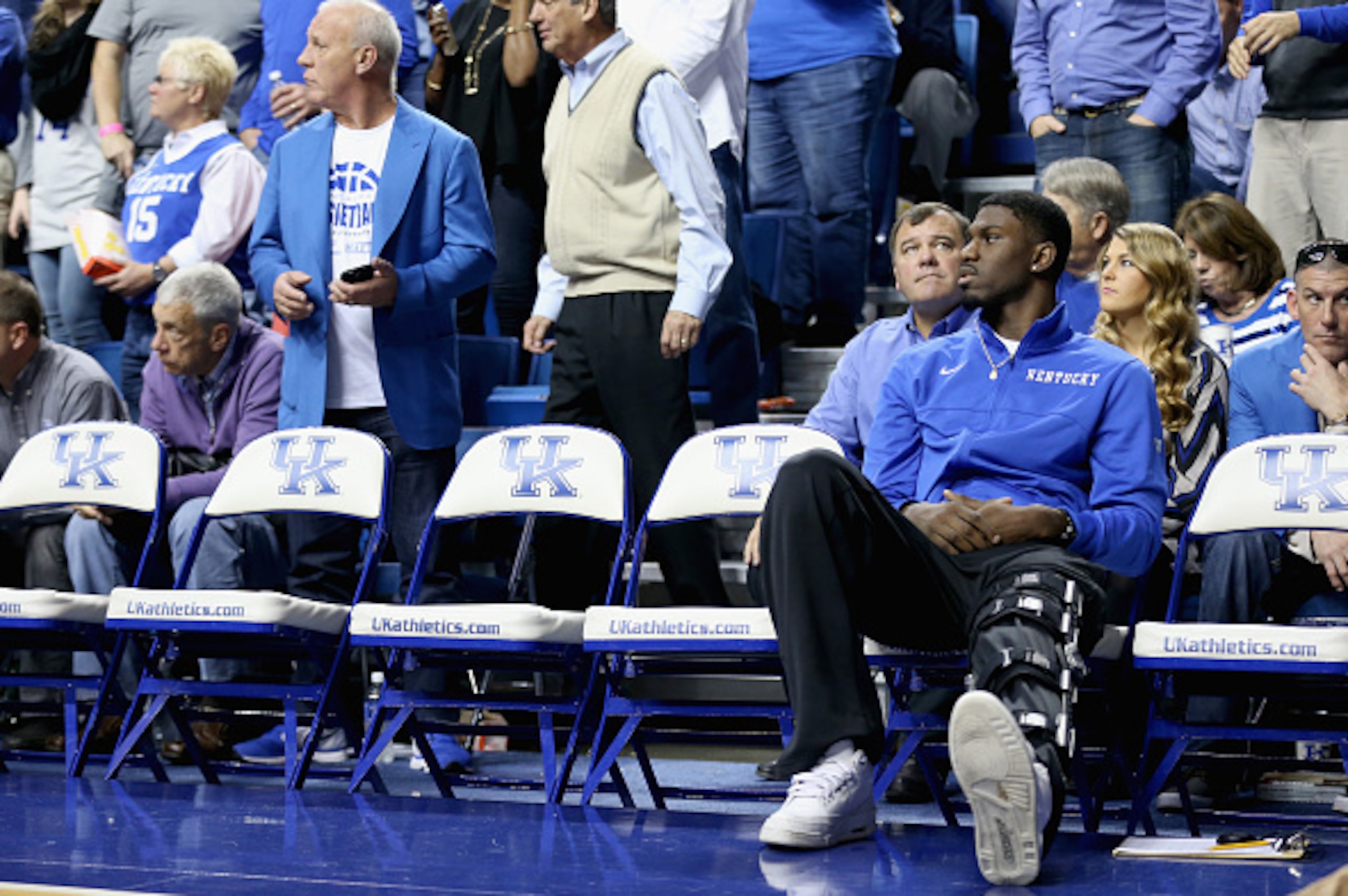 LEXINGTON, KY - DECEMBER 13:  Alex Poythress #22 of the Kentucky Wildcats sits on the bench during the game against the North Carolina Tar Heels at Rupp Arena on December 13, 2014 in Lexington, Kentucky.  Poytress was lost for the season this week due to 