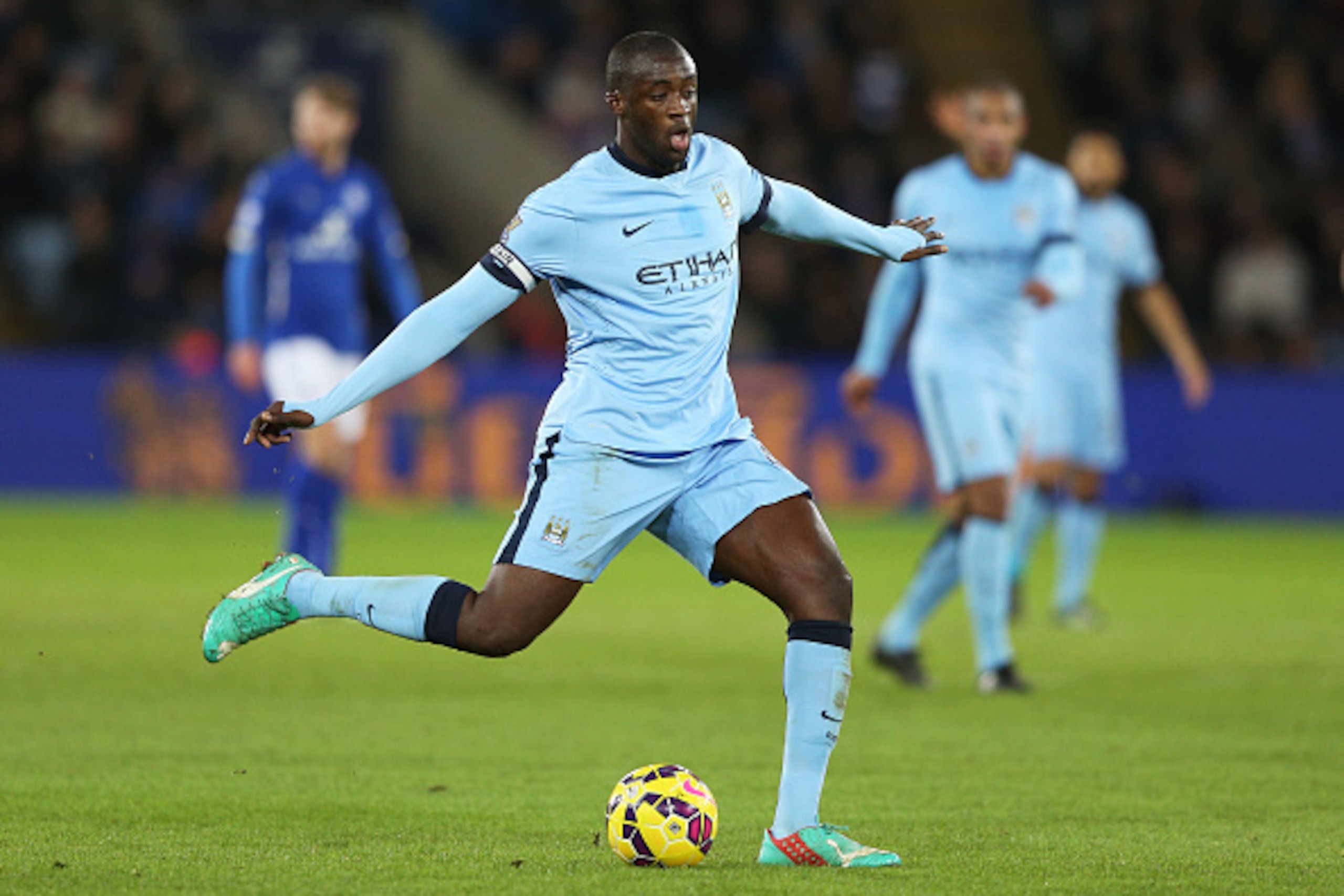 LEICESTER, ENGLAND - DECEMBER 13: Yaya Toure of Manchester City passes the ball during the Barclays Premier League match between Leicester City and Manchester City at The King Power Stadium on December 13, 2014 in Leicester, England. (Photo by Clive Mas LEICESTER, ENGLAND - DECEMBER 13: Yaya Toure of Manchester City passes the ball during the Barclays Premier League match between Leicester City and Manchester City at The King Power Stadium on December 13, 2014 in Leicester, England. (Photo by Clive Mas