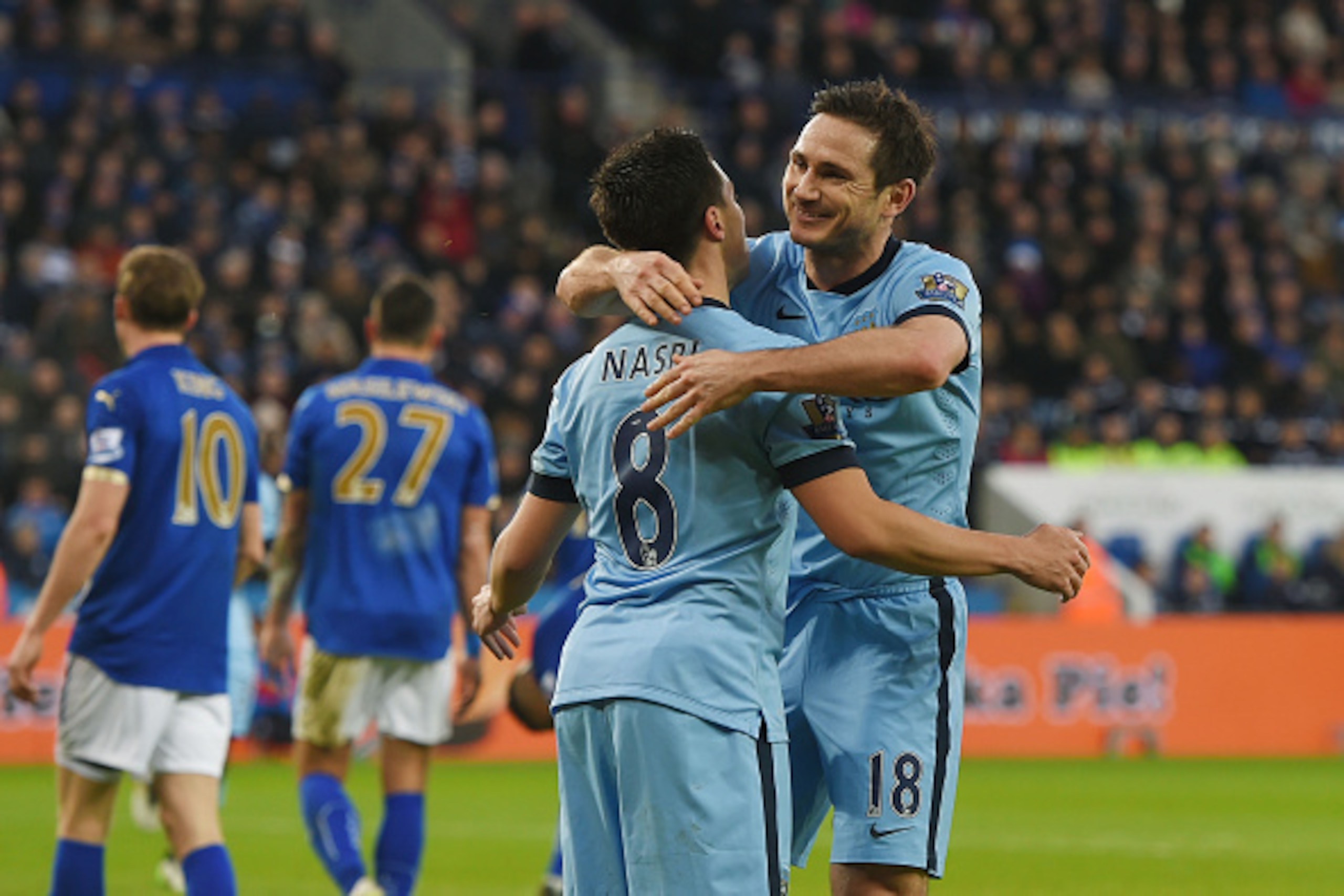 LEICESTER, ENGLAND - DECEMBER 13: Frank Lampard (R) of Manchester City celebrate Samir Nasri of Manchester City after scoring the opening goal during the Barclays Premier League match between Leicester City and Manchester City at The King Power Stadium o LEICESTER, ENGLAND - DECEMBER 13: Frank Lampard (R) of Manchester City celebrate Samir Nasri of Manchester City after scoring the opening goal during the Barclays Premier League match between Leicester City and Manchester City at The King Power Stadium o