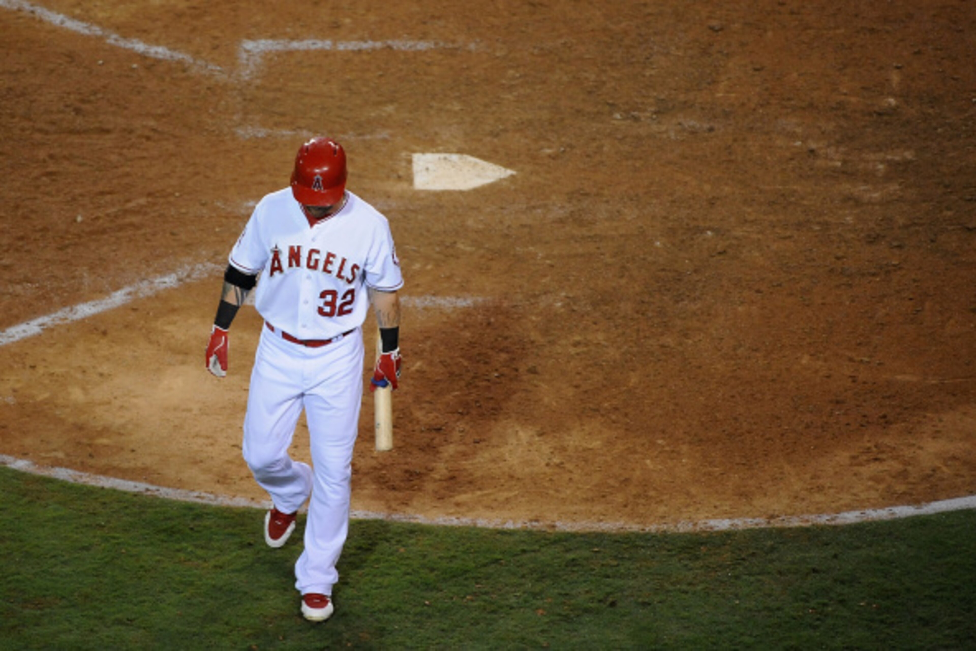 ANAHEIM, CA - AUGUST 06:  Josh Hamilton #32 of the Los Angeles Angels of Anaheim reacts after striking out in the ninth inning during a game against the Los Angeles Dodgers at Angel Stadium of Anaheim on August 6, 2014 in Anaheim, California.  (Photo by J