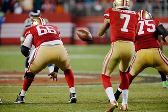 SANTA CLARA, CA - NOVEMBER 27:  Center Marcus Martin #66 of the San Francisco 49ers snaps the ball to quarterback Colin Kaepernick #7 against the Seattle Seahawks in the fourth quarter on November 27, 2014 at Levi's Stadium in Santa Clara, California.  Th