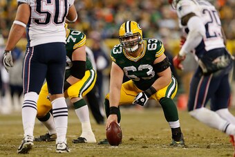 GREEN BAY, WI - NOVEMBER 30:  Center Corey Linsley #63 of the Green Bay Packers prepares to snap the football during the NFL game against the New England Patriots at Lambeau Field on November 30, 2014 in Green Bay, Wisconsin. The Packers defeated the Patr