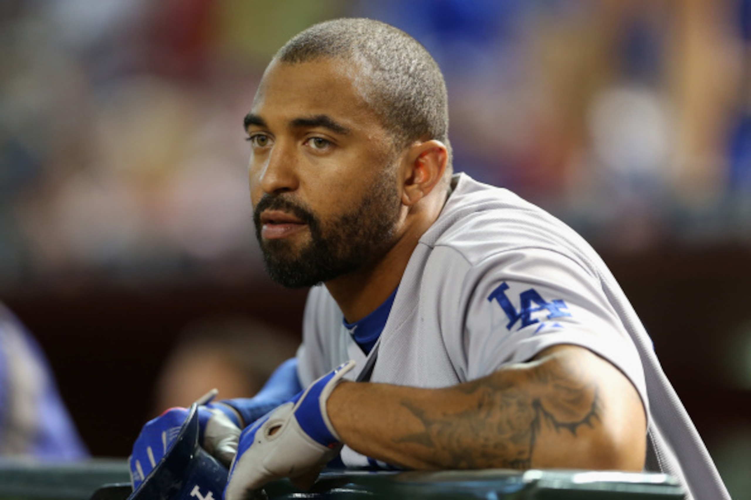 PHOENIX, AZ - AUGUST 27: Matt Kemp #27 of the Los Angeles Dodgers watches from the dugout during the MLB game against the Arizona Diamondbacks at Chase Field on August 27, 2014 in Phoenix, Arizona. (Photo by Christian Petersen/Getty Images) PHOENIX, AZ - AUGUST 27: Matt Kemp #27 of the Los Angeles Dodgers watches from the dugout during the MLB game against the Arizona Diamondbacks at Chase Field on August 27, 2014 in Phoenix, Arizona. (Photo by Christian Petersen/Getty Images)