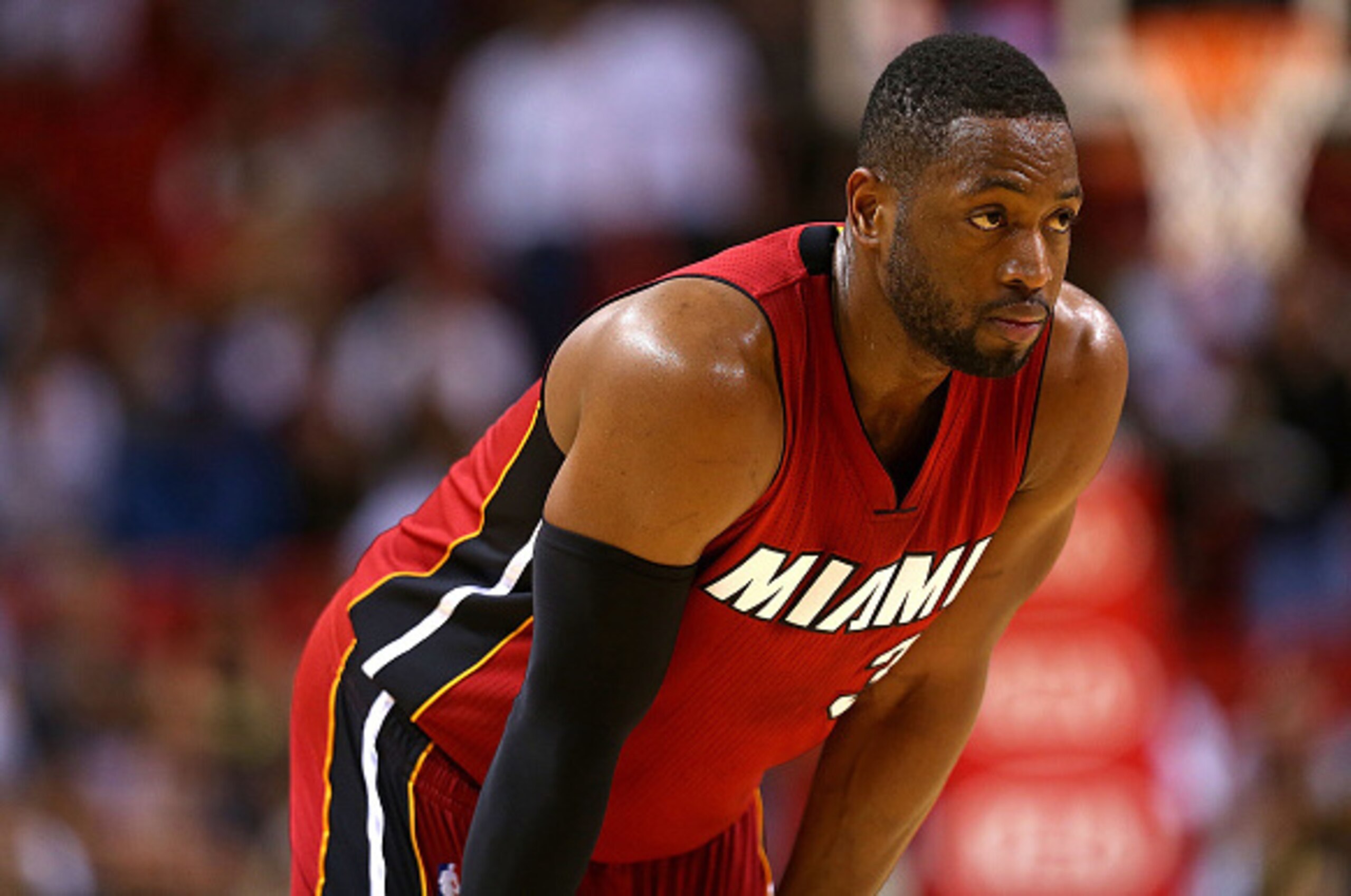 MIAMI, FL - DECEMBER 17:  Dwyane Wade #3 of the Miami Heat looks on during a game against the Utah Jazz at American Airlines Arena on December 17, 2014 in Miami, Florida. NOTE TO USER: User expressly acknowledges and agrees that, by downloading and/or usi