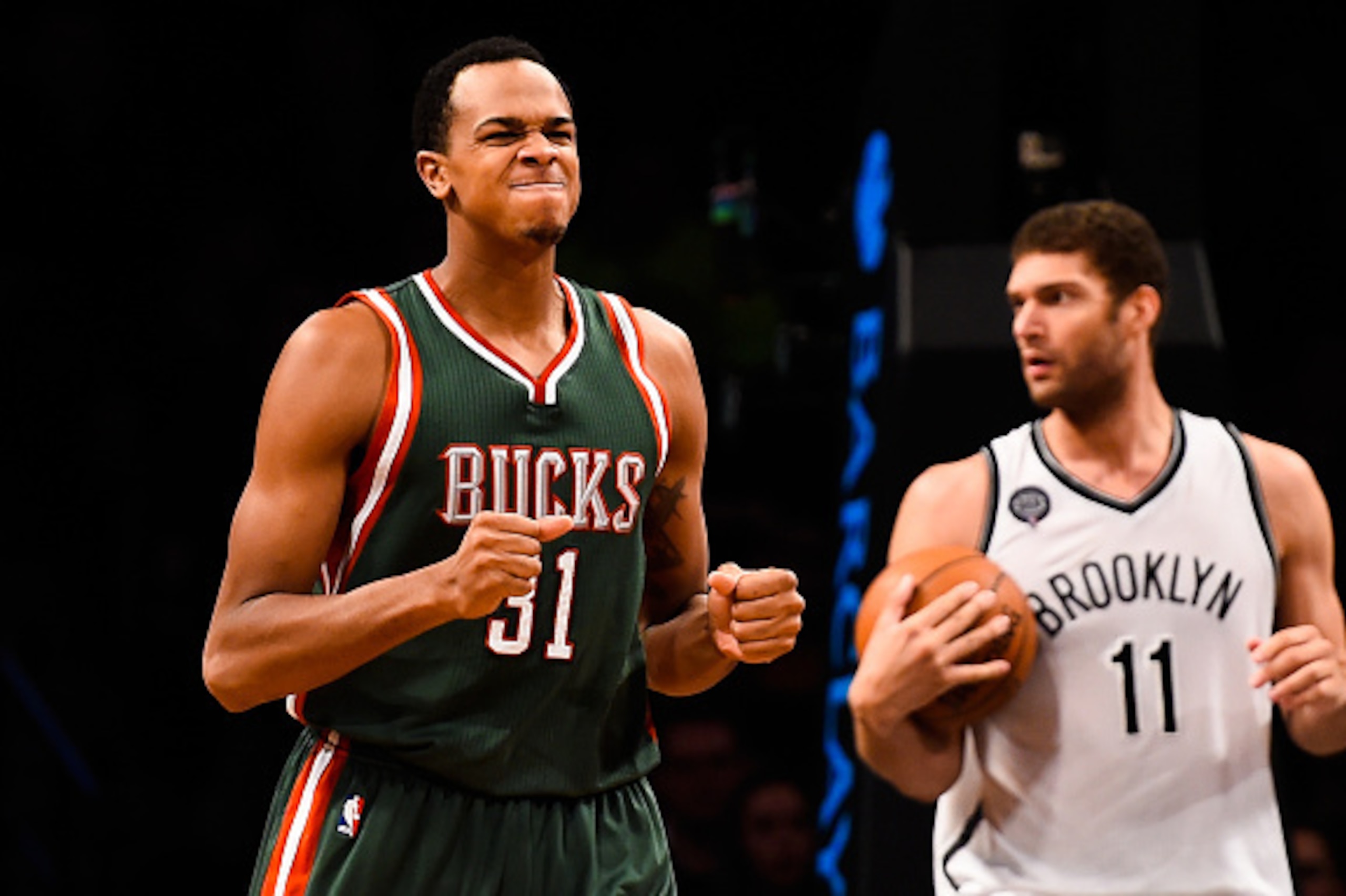 NEW YORK, NY - NOVEMBER 19: John Henson #31 of the Milwaukee Bucks reacts after a foul in triple overtime during a game against the Brooklyn Nets at the Barclays Center on November 19, 2014 in the Brooklyn borough of New York City. NOTE TO USER: User expr