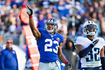 NASHVILLE, TN - DECEMBER 7:  Rashad Jennings #23 of the New York Giants signals for a first down during a game against the Tennessee Titans at LP Field on December 7, 2014 in Nashville, Tennessee.  The Giants defeated the Titans 36-7.  (Photo by Wesley Hi