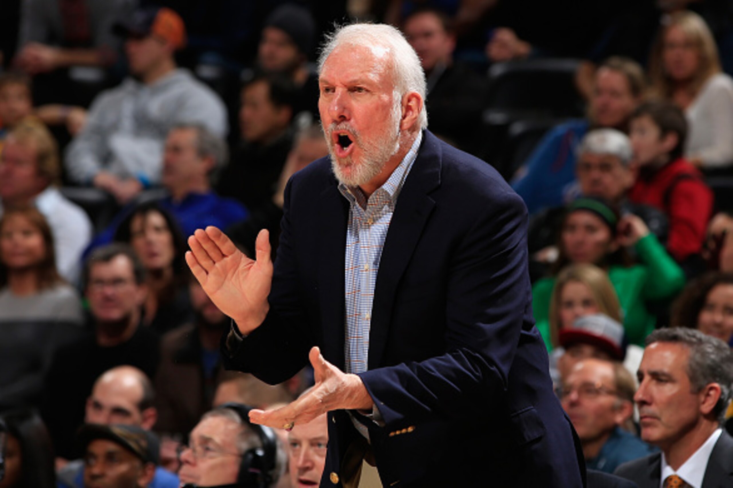 DENVER, CO - DECEMBER 14:  Head coach Gregg Popovich of the San Antonio Spurs leads his team against the Denver Nuggets at Pepsi Center on December 14, 2014 in Denver, Colorado. NOTE TO USER: User expressly acknowledges and agrees that, by downloading and