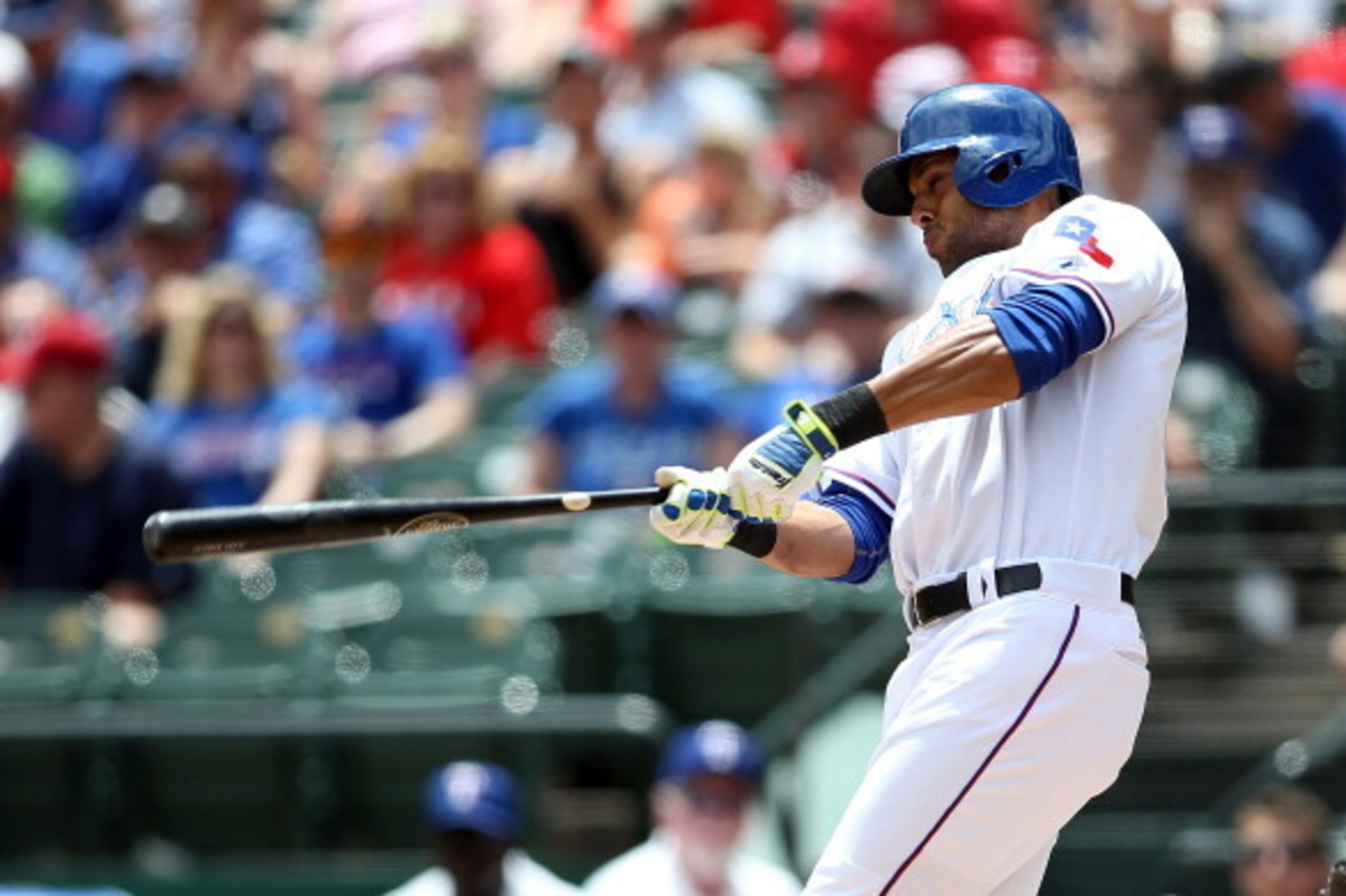 ARLINGTON, TX - JUNE 8: Alex Rios #51 of the Texas Rangers hits in the second inning against the Cleveland Indians at Globe Life Park in Arlington on June 8, 2014 in Arlington, Texas.  (Photo by Rick Yeatts/Getty Images)