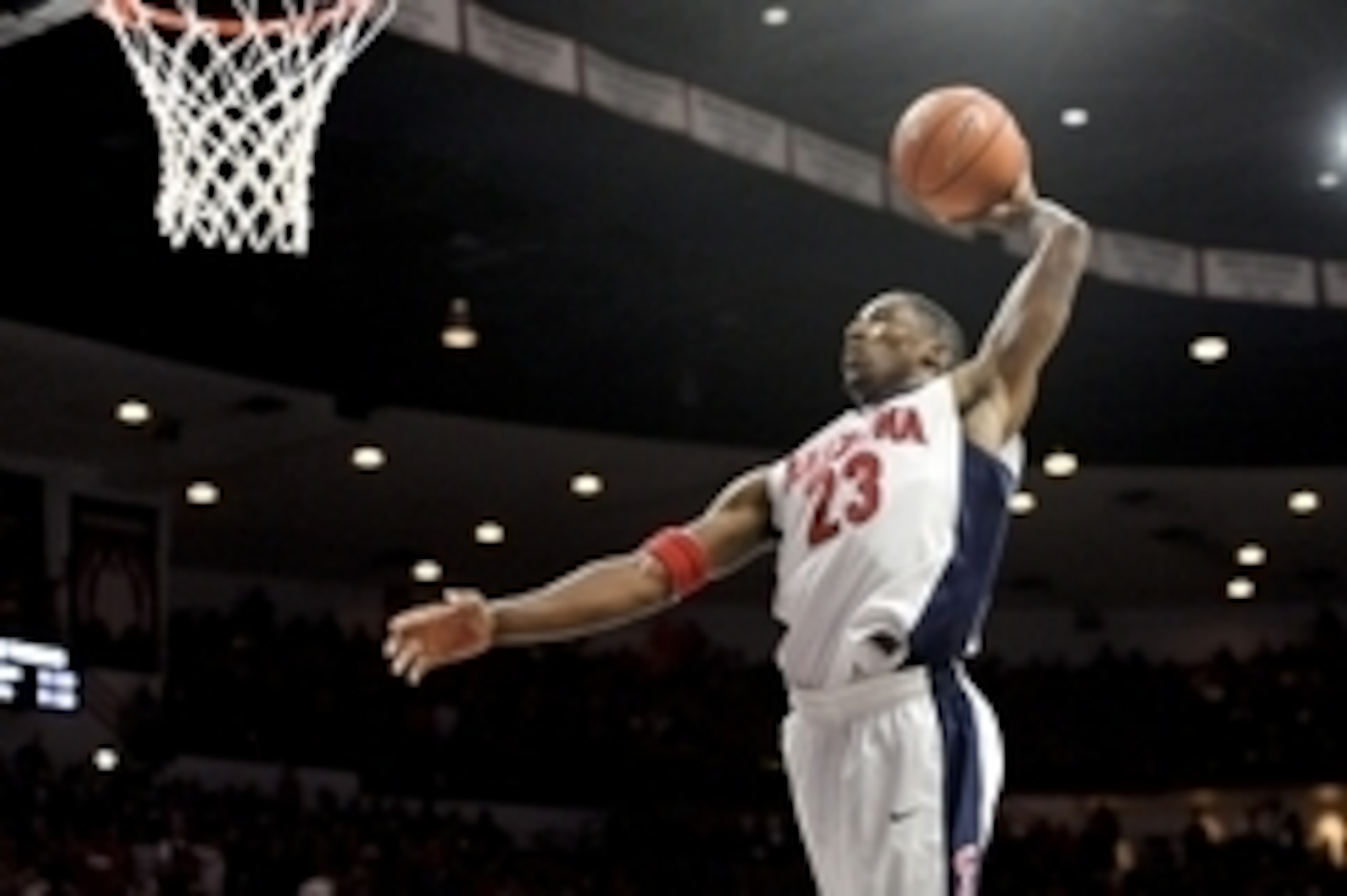 Dec 13, 2014; Tucson, AZ, USA; Arizona Wildcats forward Rondae Hollis-Jefferson (23) dunks the ball against the Michigan Wolverines during the second half at McKale Center. Arizona won 80-53. Mandatory Credit: Casey Sapio-USA TODAY Sports