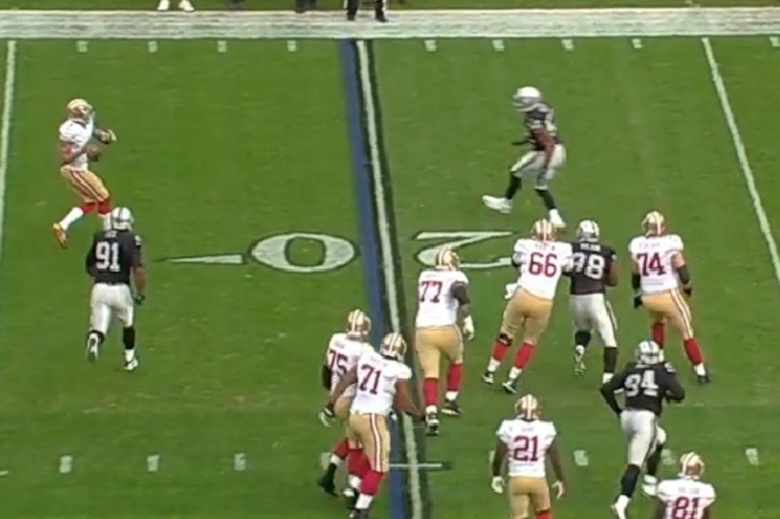 Linebacker Khalil Mack stays on Kaepernick, preventing him from scrambling. Kaepernick then heaves a prayer downfield.
