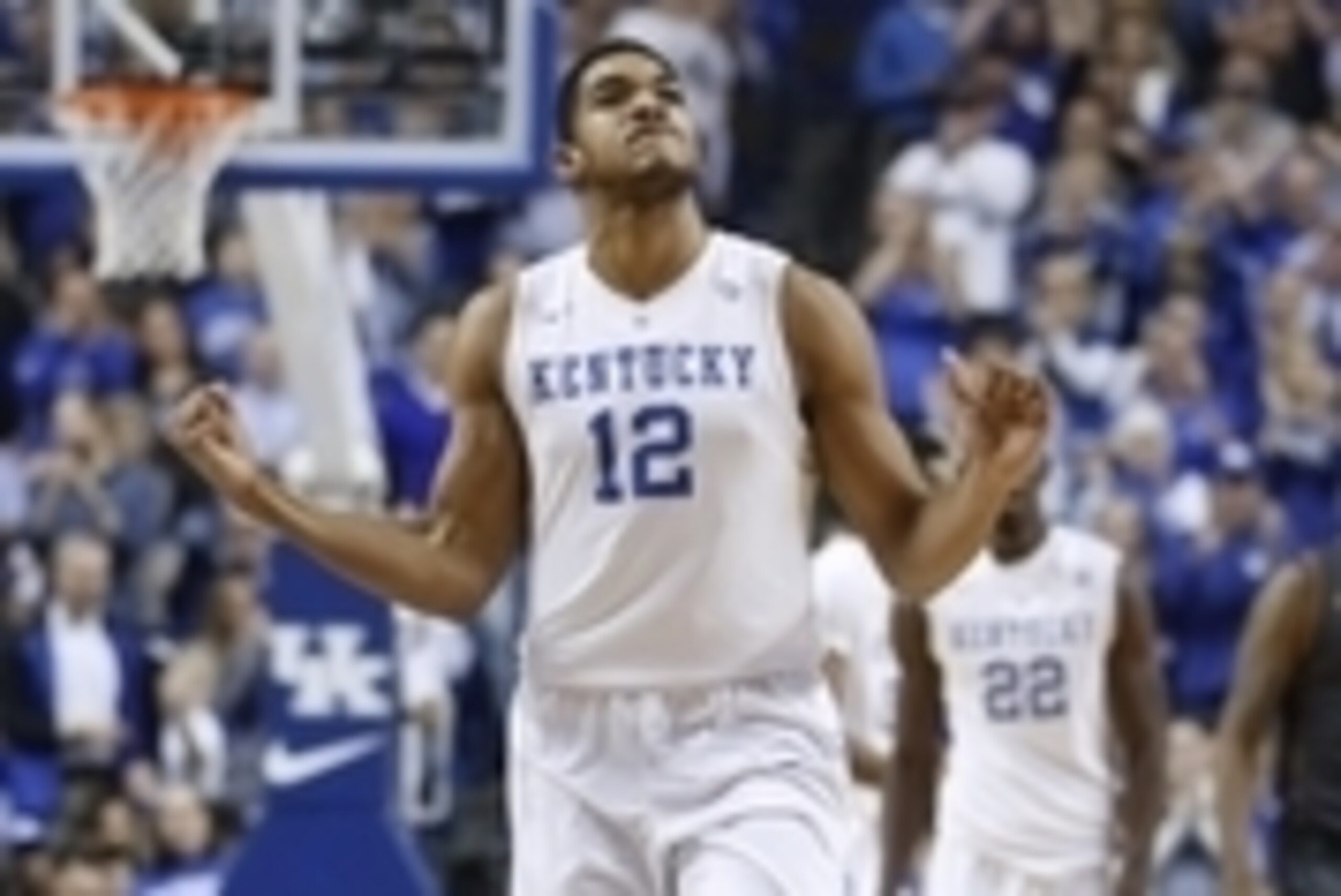 Dec 5, 2014; Lexington, KY, USA; Kentucky Wildcats forward Karl-Anthony Towns (12) celebrates during the game against the Texas Longhorns in the second half at Rupp Arena. Kentucky defeated Texas 63-51. Mandatory Credit: Mark Zerof-USA TODAY Sports
