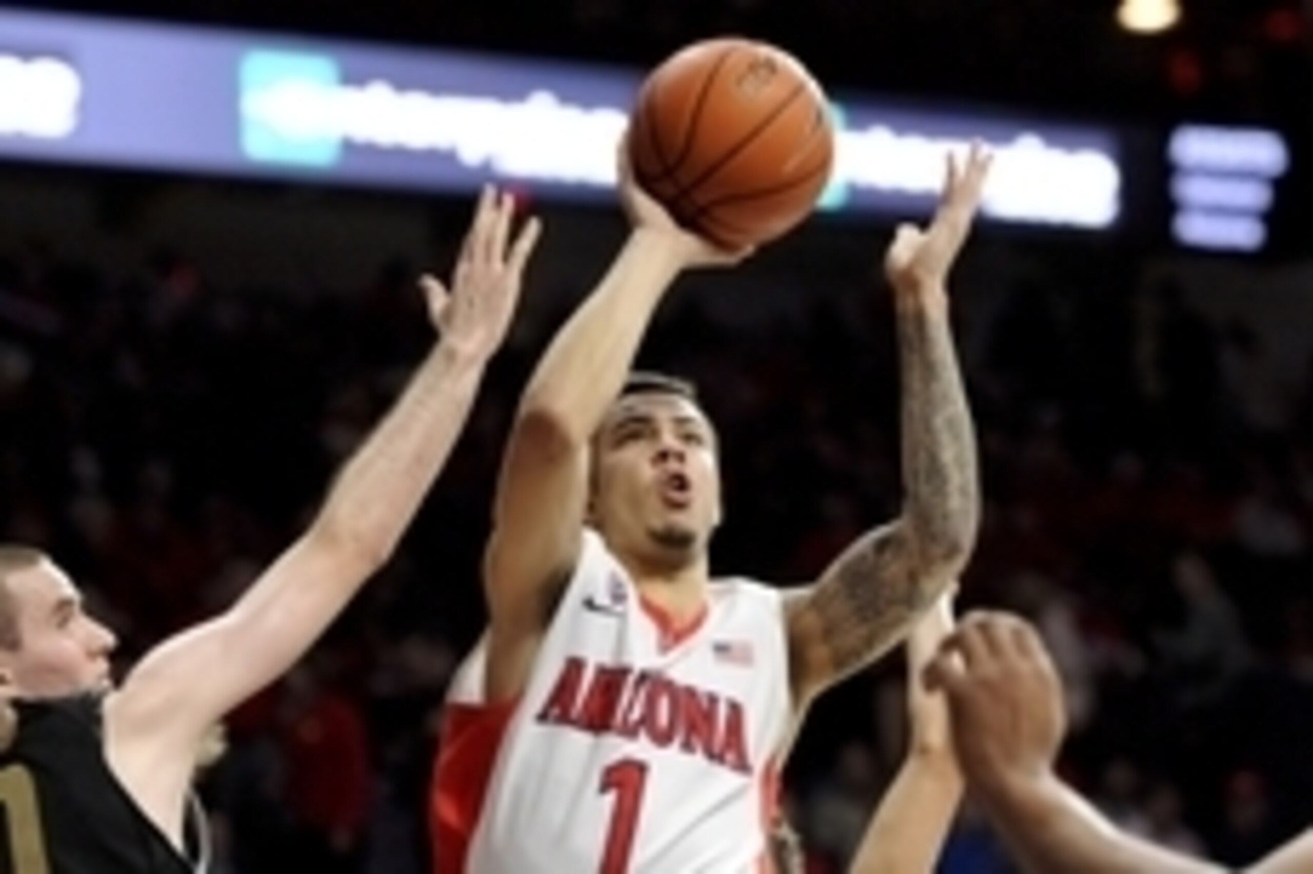 Dec 16, 2014; Tucson, AZ, USA; Arizona Wildcats guard Gabe York (1) shoots over Oakland Golden Grizzlies guard Max Hooper (10) during the second half at McKale Center. Arizona won 101-64. Mandatory Credit: Casey Sapio-USA TODAY Sports