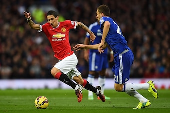 MANCHESTER, ENGLAND - OCTOBER 26:  Angel Di Maria of Manchester United competes with Nemanja Matic of Chelsea during the Barclays Premier League match between Manchester United and Chelsea at Old Trafford on October 26, 2014 in Manchester, England.  (Phot