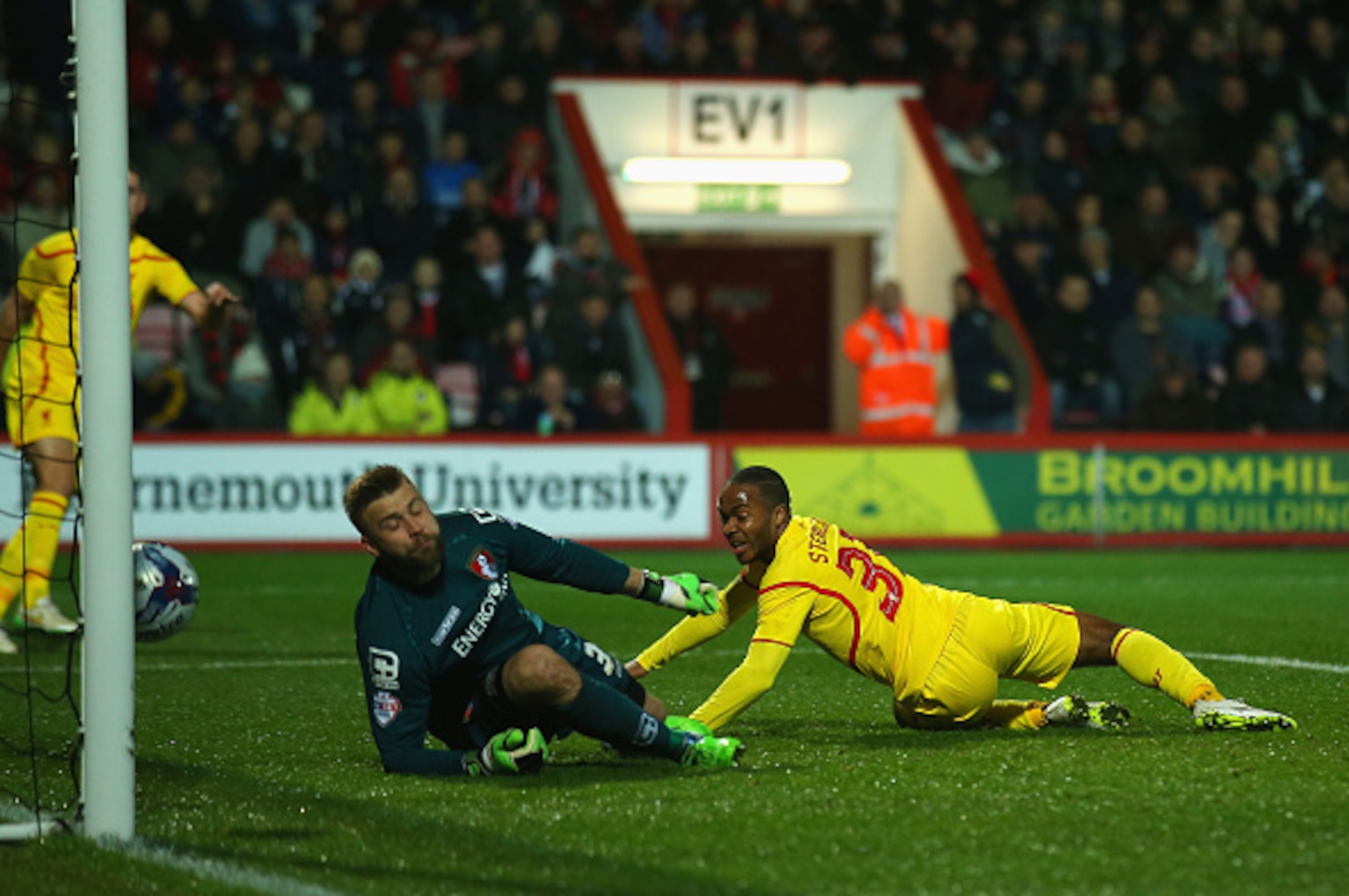 BOURNEMOUTH, ENGLAND - DECEMBER 17: Raheem Sterling of Liverpool scores the opening goal during the Capital One Cup Quarter-Final match between Bournemouth and Liverpool at Goldsands Stadium on December 17, 2014 in Bournemouth, England.  (Photo by Bryn Le