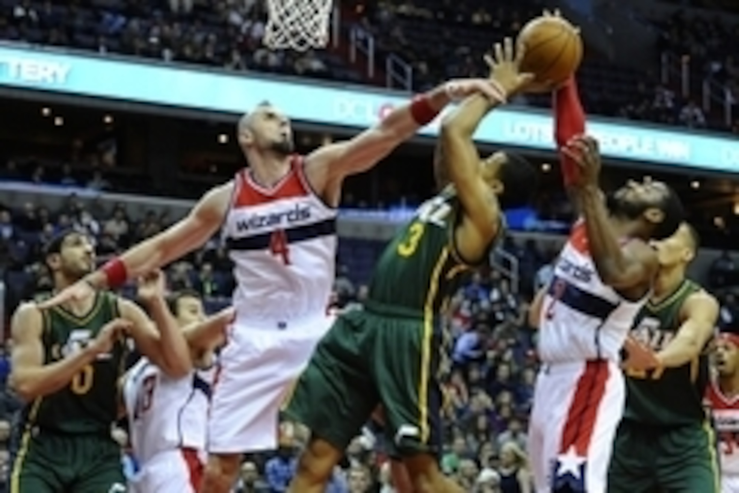 Dec 14, 2014; Washington, DC, USA; Washington Wizards guard John Wall (2) blocks the shot by Utah Jazz guard Trey Burke (3) as Washington Wizards center Marcin Gortat (4) defends during the first half at Verizon Center. Mandatory Credit: Brad Mills-USA TO Dec 14, 2014; Washington, DC, USA; Washington Wizards guard John Wall (2) blocks the shot by Utah Jazz guard Trey Burke (3) as Washington Wizards center Marcin Gortat (4) defends during the first half at Verizon Center. Mandatory Credit: Brad Mills-USA TO