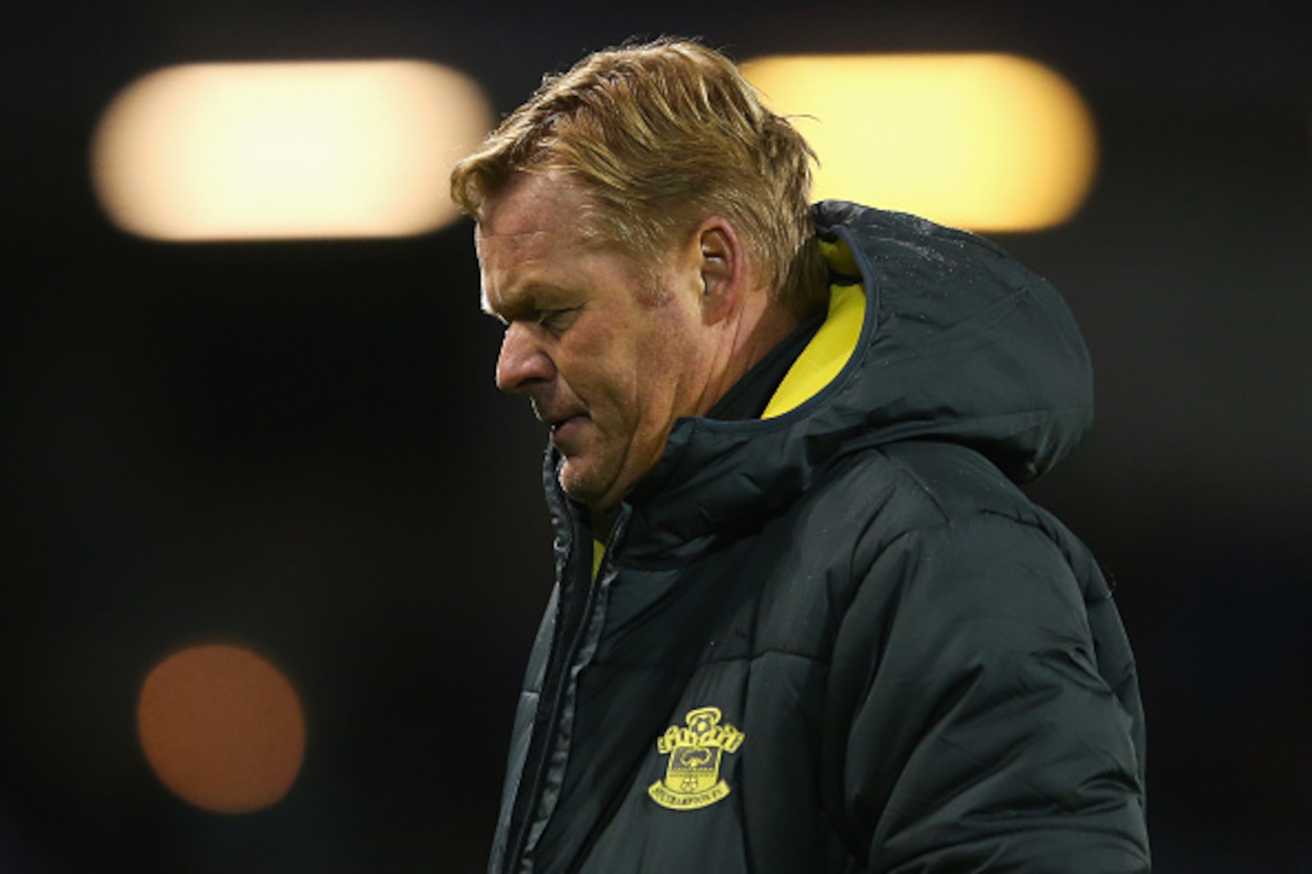 BURNLEY, ENGLAND - DECEMBER 13: Ronald Koeman, manager of Southampton leaves the field after the Barclays Premier League match between Burnley and Southampton at Turf Moor on December 13, 2014 in Burnley, England.  (Photo by Alex Livesey/Getty Images)