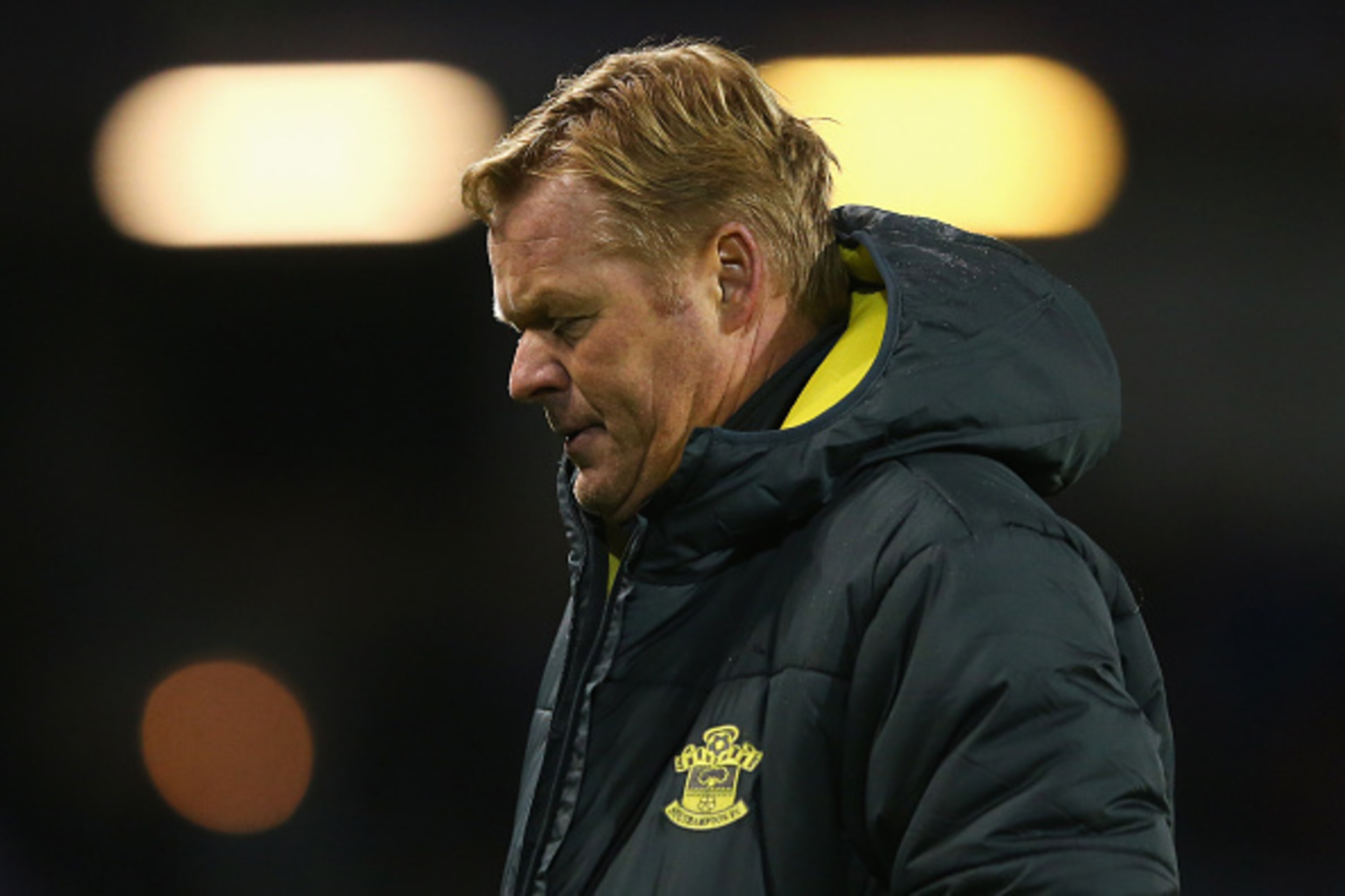 BURNLEY, ENGLAND - DECEMBER 13: Ronald Koeman, manager of Southampton leaves the field after the Barclays Premier League match between Burnley and Southampton at Turf Moor on December 13, 2014 in Burnley, England.  (Photo by Alex Livesey/Getty Images)